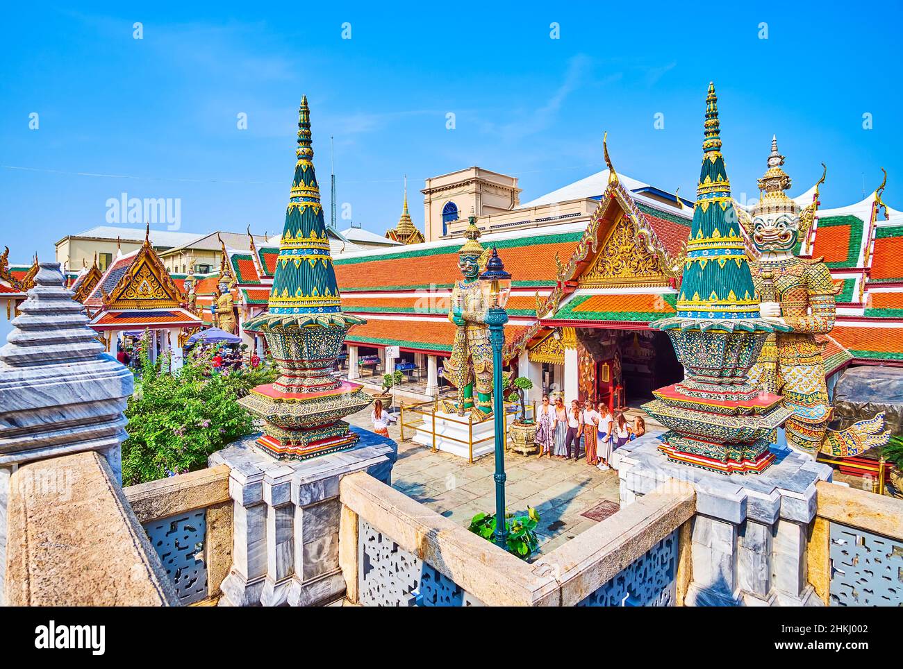 BANGKOK, THAILAND - MAY 12, 2019: Small pavilions around golden colonnade of Phra Ubosot in Grand Palace, on May 12 in Bangkok, Thailand Stock Photo