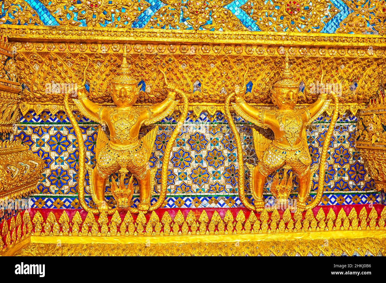 BANGKOK, THAILAND - MAY 12, 2019: The golden Garudas on facade of Ubosot in Emerald Buddha Temple of Grand Palace, on May 12 in Bangkok, Thailand Stock Photo