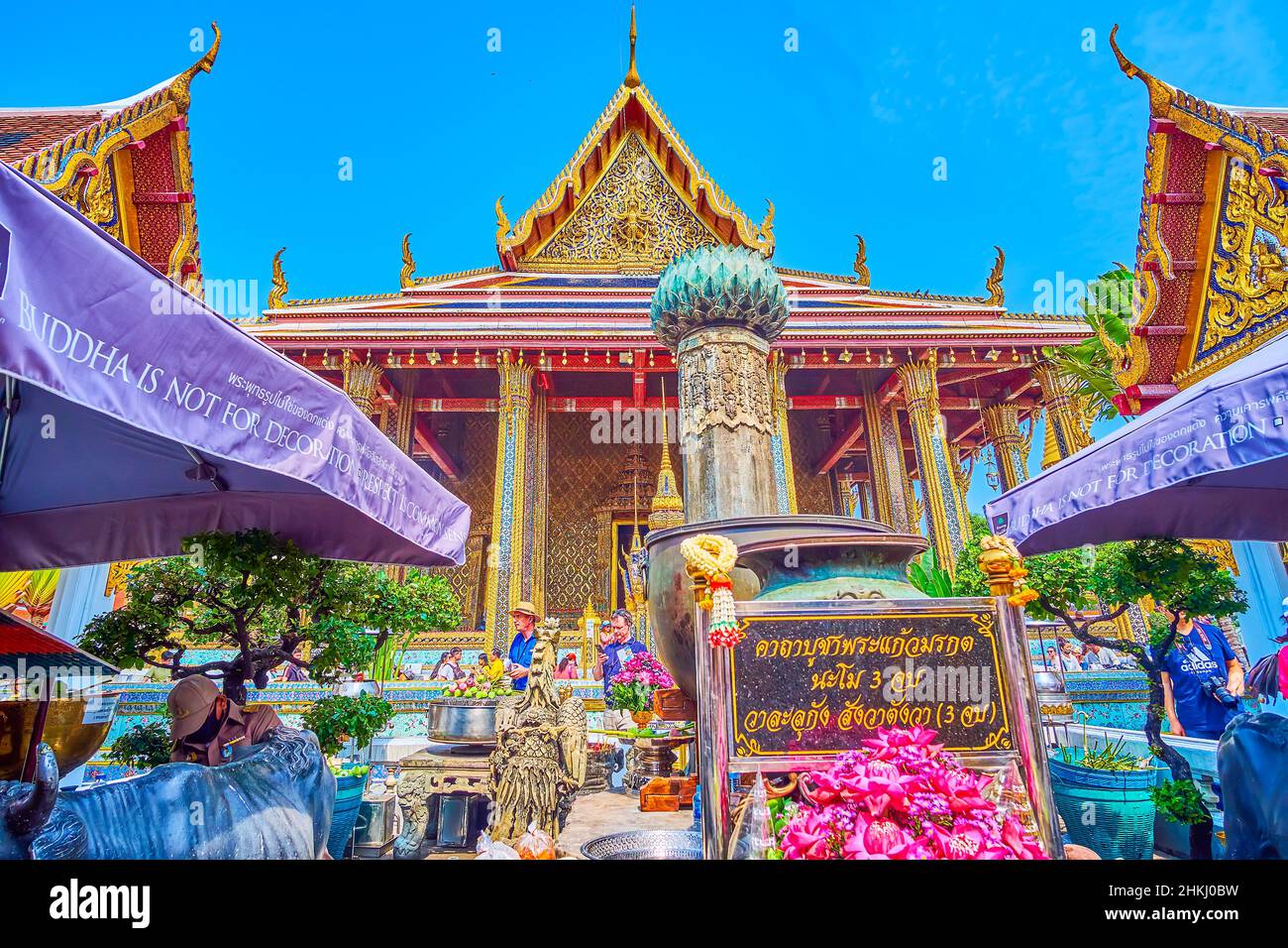 BANGKOK, THAILAND - MAY 12, 2019: The crowded outdoor altar at the main entrance to Ubosot in Grand Palace, on May 12 in Bangkok, Thailand Stock Photo
