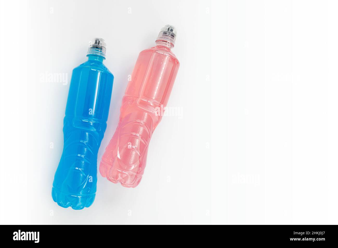 https://c8.alamy.com/comp/2HKJ0J7/isotonic-energy-drink-bottle-with-blue-and-pink-transparent-liquid-sport-beverage-on-white-background-2HKJ0J7.jpg