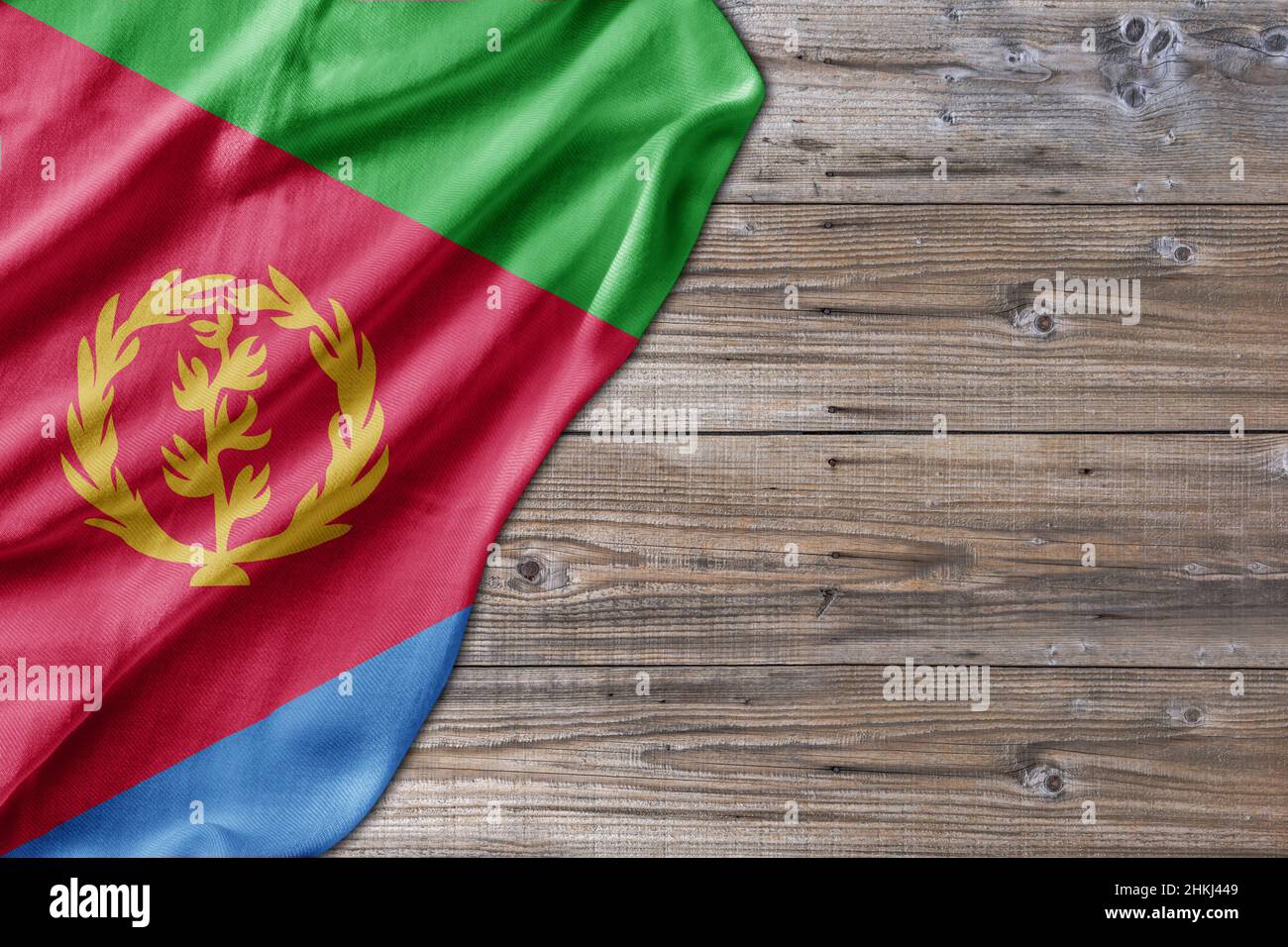Wooden pattern old nature table board with Eritrea flag Stock Photo - Alamy