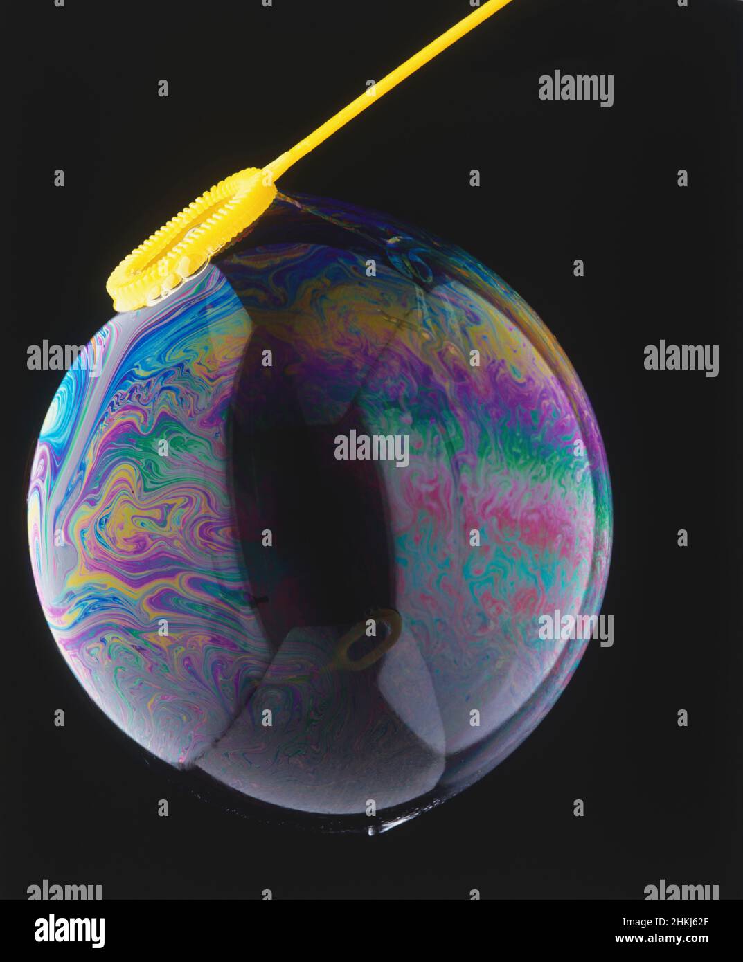 Colourful pattern formed on surface of soap bubble Stock Photo - Alamy