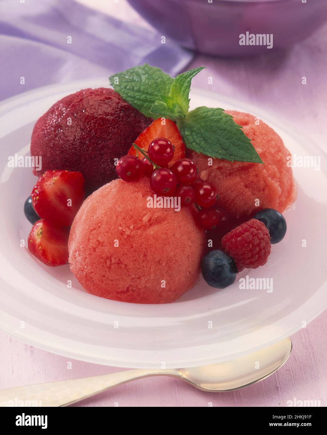Three scoops of fruit sorbet Stock Photo Alamy