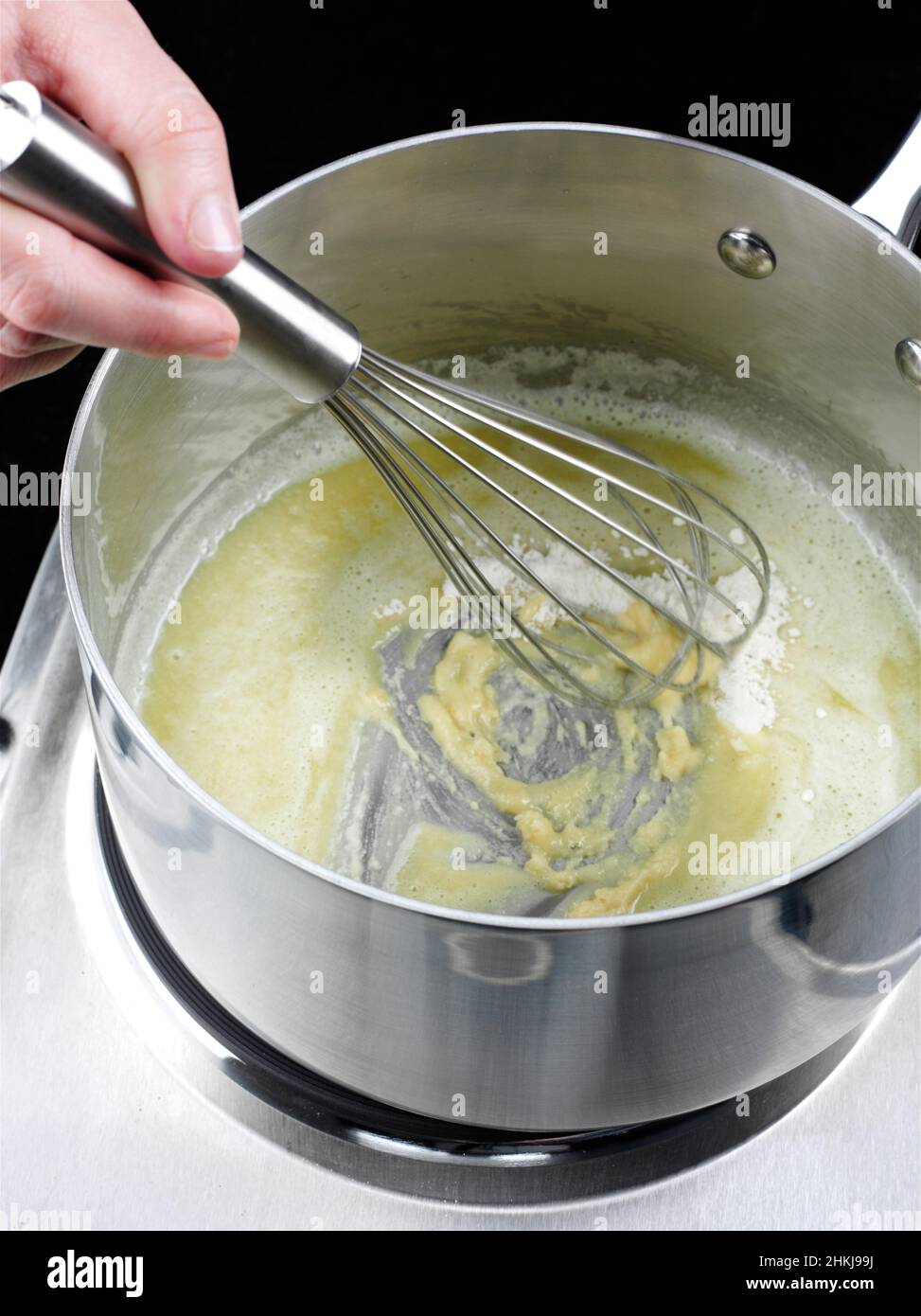 Making cheese souffles Stock Photo - Alamy