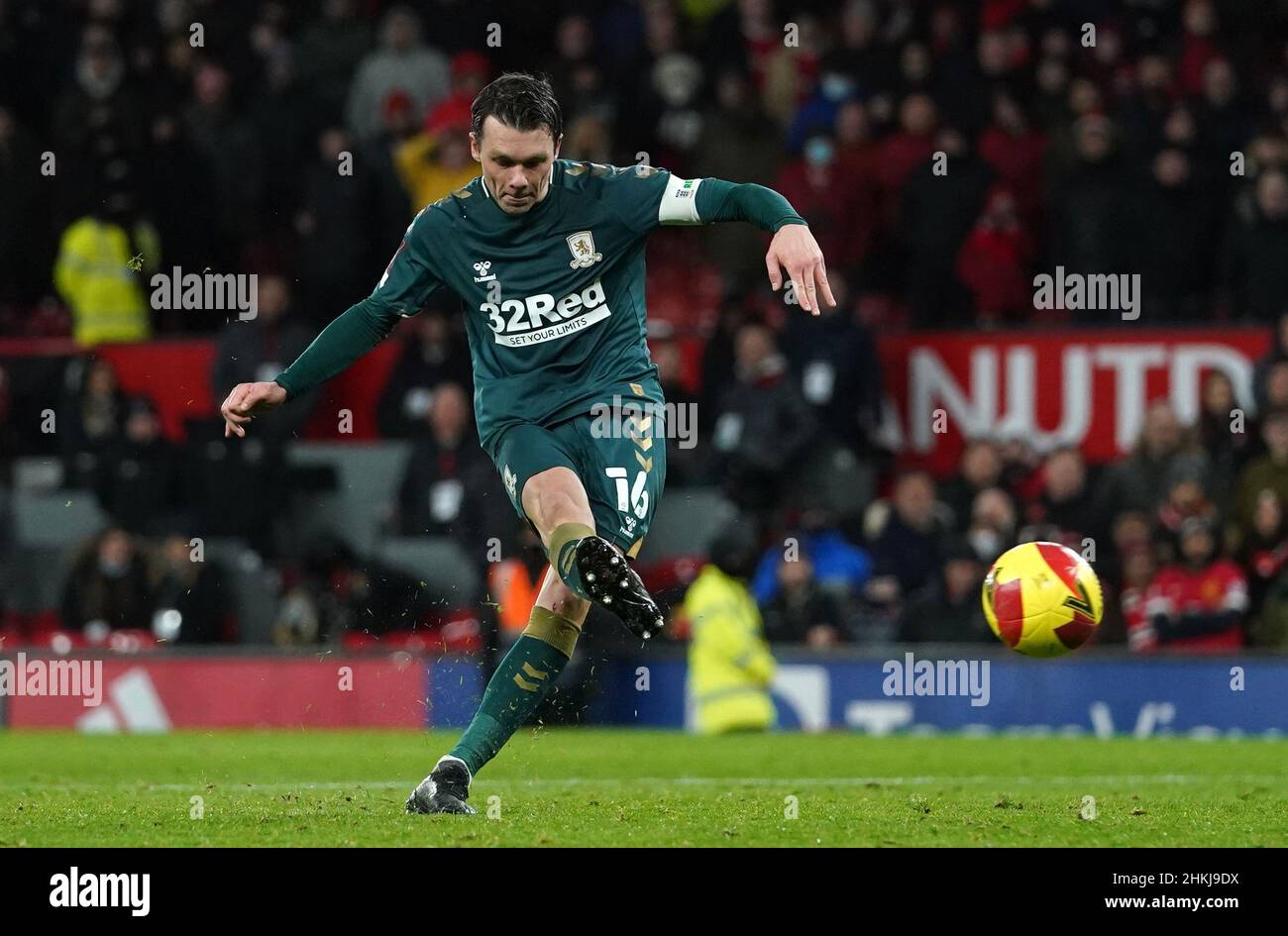 Middlesbrough's Jonny Howson takes a scores a penalty in the shoot-out during the Emirates FA Cup fourth round match at Old Trafford, Manchester. Picture date: Friday February 4, 2022. Stock Photo