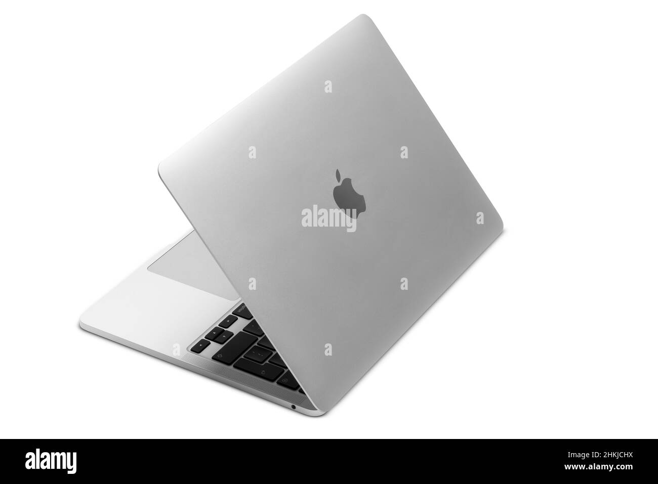 Izmir, Turkey - January 10, 2022: Half opened Apple Brand M1 Model Macbook pro laptop computer on a white background Stock Photo