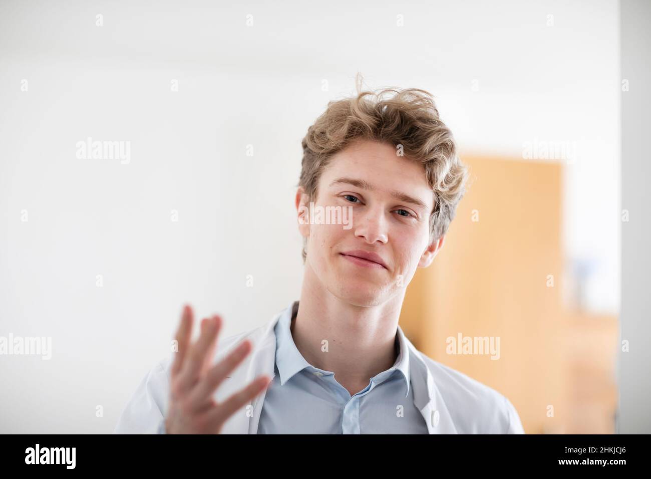 young doctor male with coat in a doctor's office Stock Photo