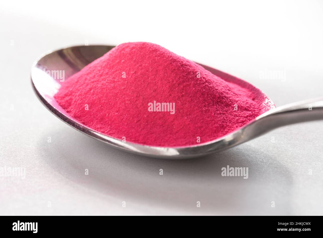 Pink Food Coloring Powder on a Vintage Spoon Stock Photo Alamy