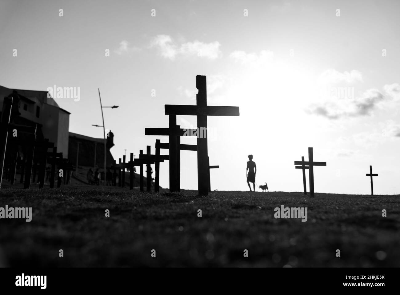 Crosses fixed to the ground in honor of those killed by Covid-19 at Farol da Barra in Salvador, Bahia, Brazil. Stock Photo