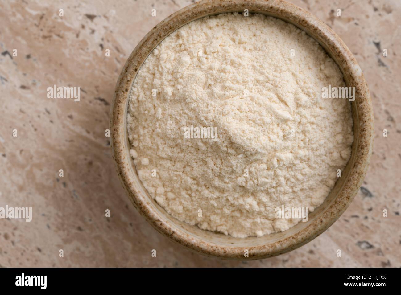 Millet Flour in a Bowl Stock Photo