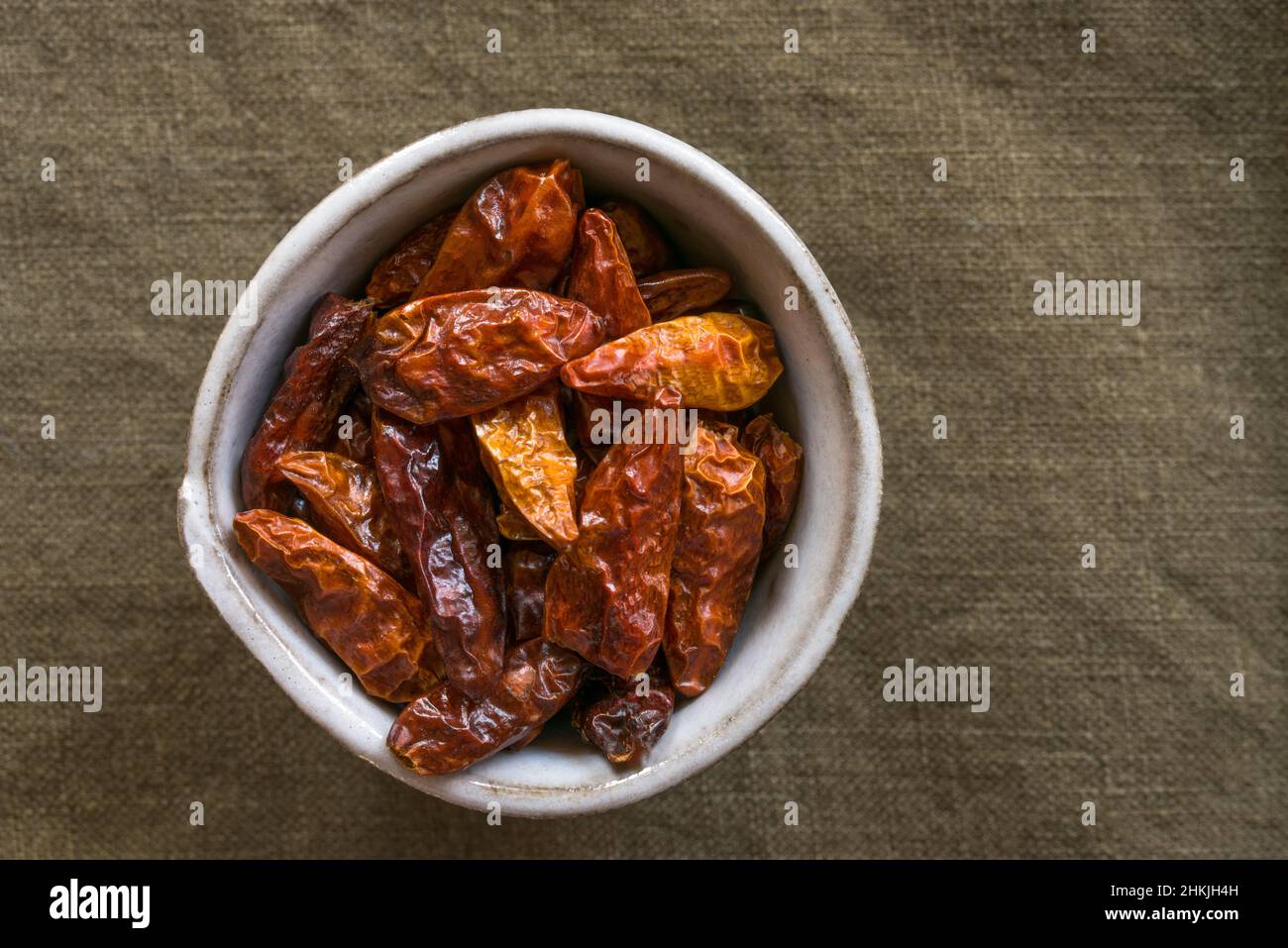 Dried Bird's Eye Peppers in a Bowl Stock Photo