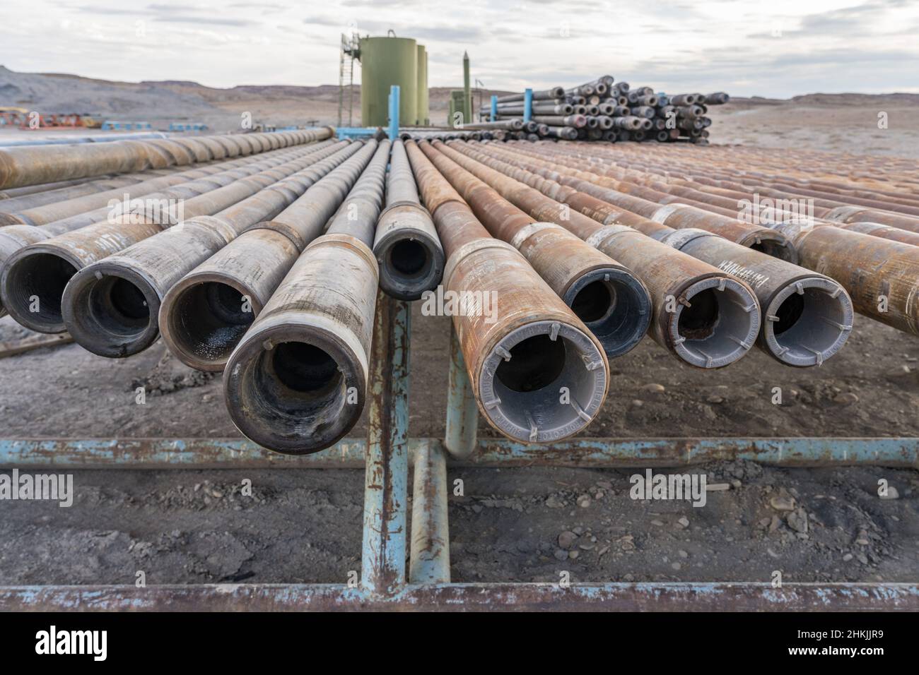 Drill pipes on a pipe rack Stock Photo - Alamy