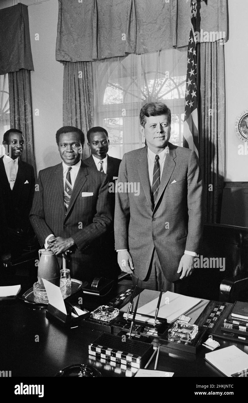 Grace Ibingira, Ugandan Prime Minister Milton Obote, John Kakonge with U.S. President John Kennedy in Oval Office, White House, Washington, DC, USA, Warren K. Leffler, US News & World Report Magazine Collection, October 22, 1962 Stock Photo