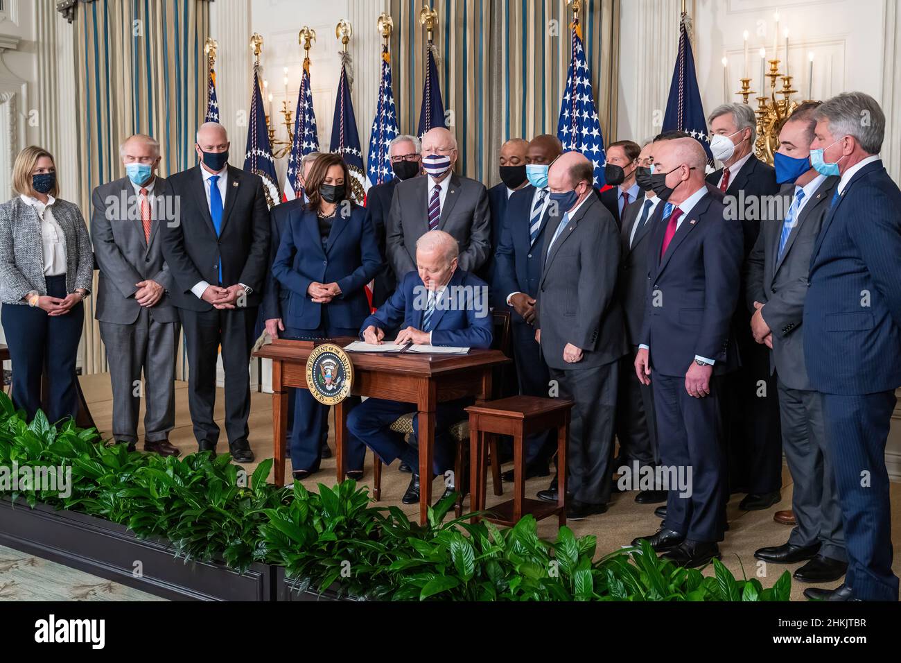 President Joe Biden signs the COPS Counseling Act, the Protecting America’s First Responders Act of 2021, and the Jaime Zapata and Victor Avila Federal Officers and Employees Protection Act, Thursday, November 18, 2021, in the State Dining Room of the White House. (Official White House Photo by Adam Schultz) Stock Photo