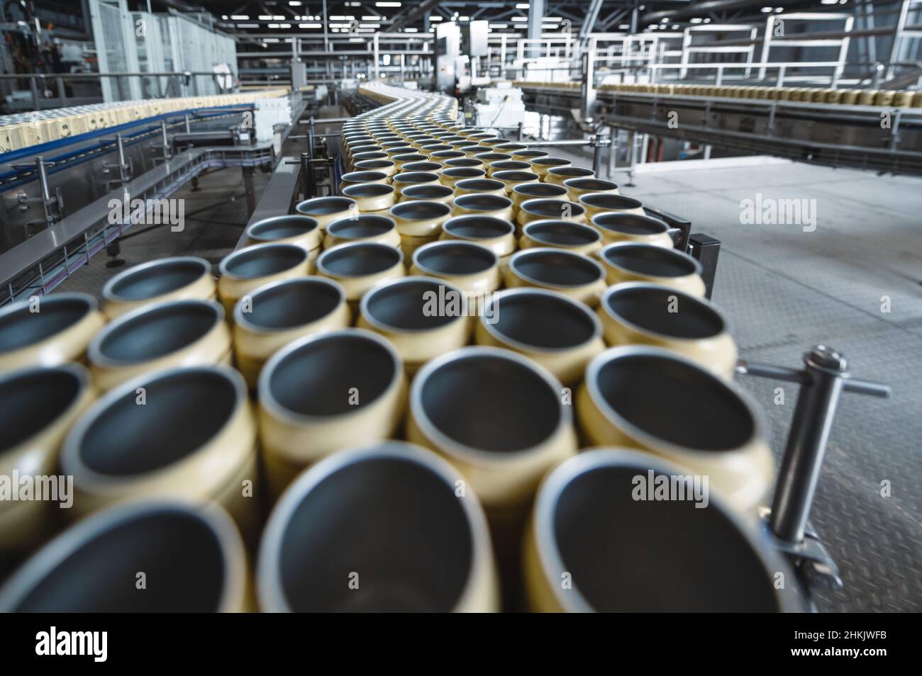 Many empty beer cans on the conveyor Stock Photo Alamy