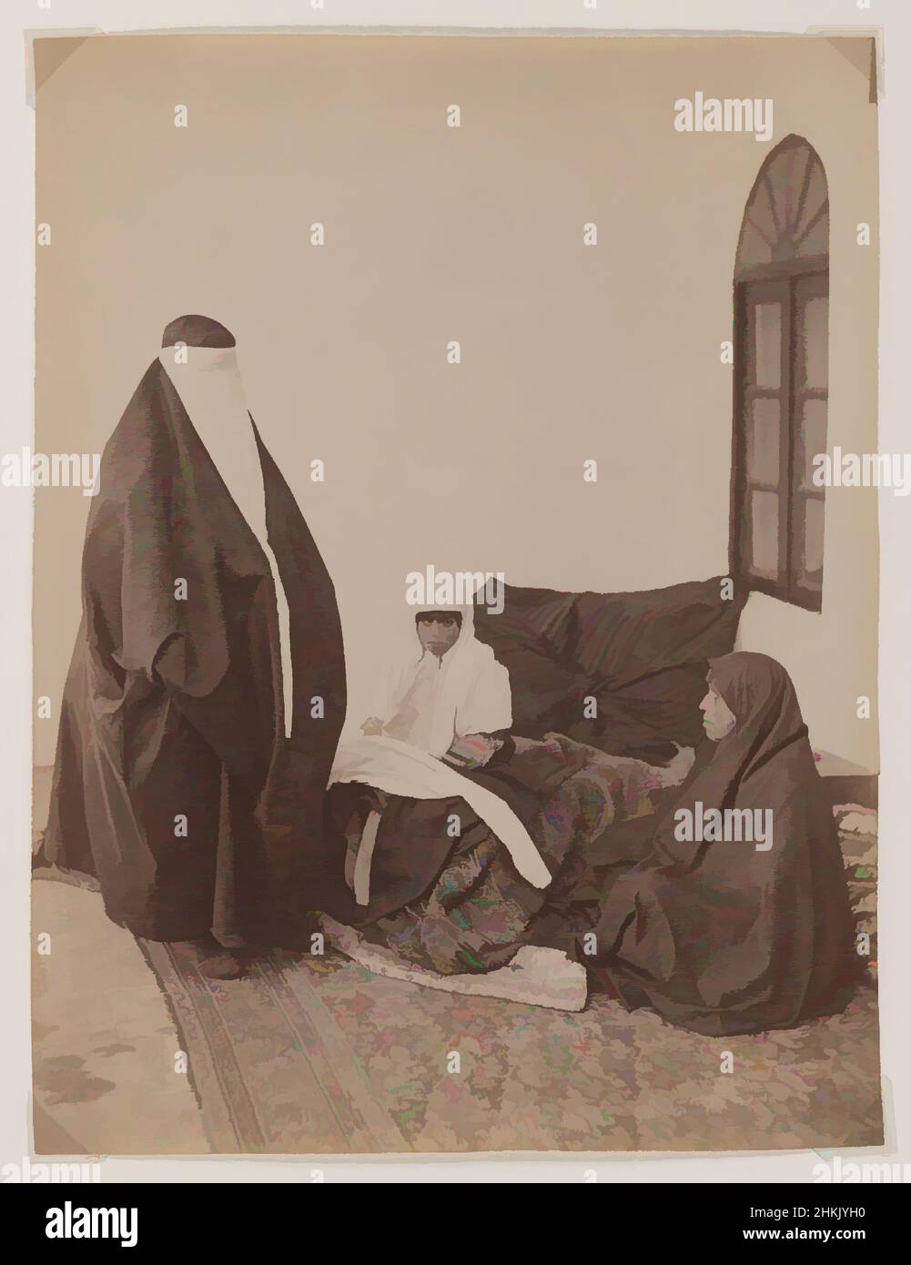 Art inspired by Two Veiled Women and a Child, Possibly Antoin Sevruguin, Albumen silver photograph, late 19th century, Qajar, Qajar Period, 9 1/8 x 6 3/16 in., 23.2 x 15.7 cm, clothing, dress, harem, hijab, interior, Iran, lifestyle, Middle East, Persian, Persian carpet, private, Classic works modernized by Artotop with a splash of modernity. Shapes, color and value, eye-catching visual impact on art. Emotions through freedom of artworks in a contemporary way. A timeless message pursuing a wildly creative new direction. Artists turning to the digital medium and creating the Artotop NFT Stock Photo