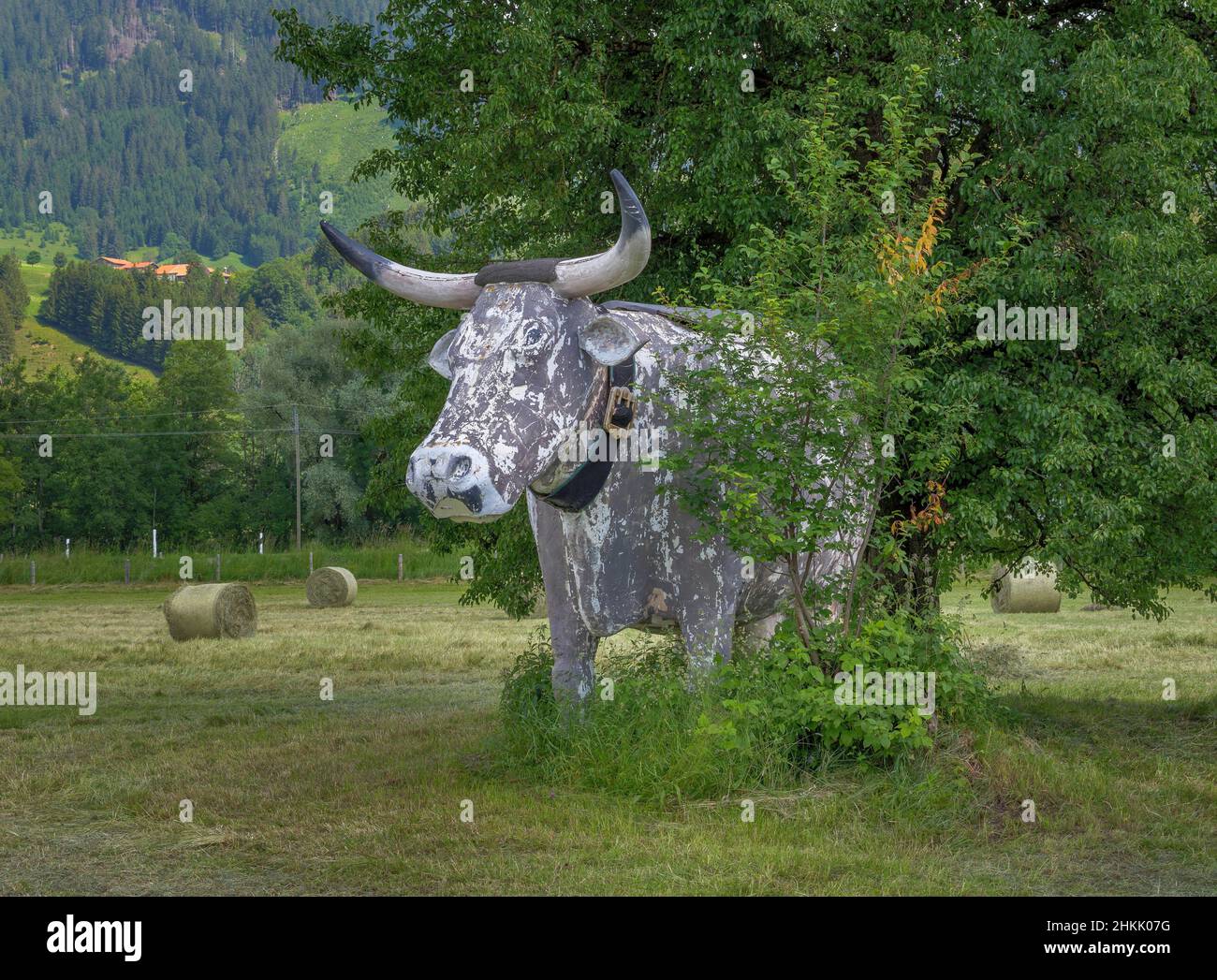 Cow figure near Wertach, Germany, Baden-Wuerttemberg, Allgaeu Stock Photo
