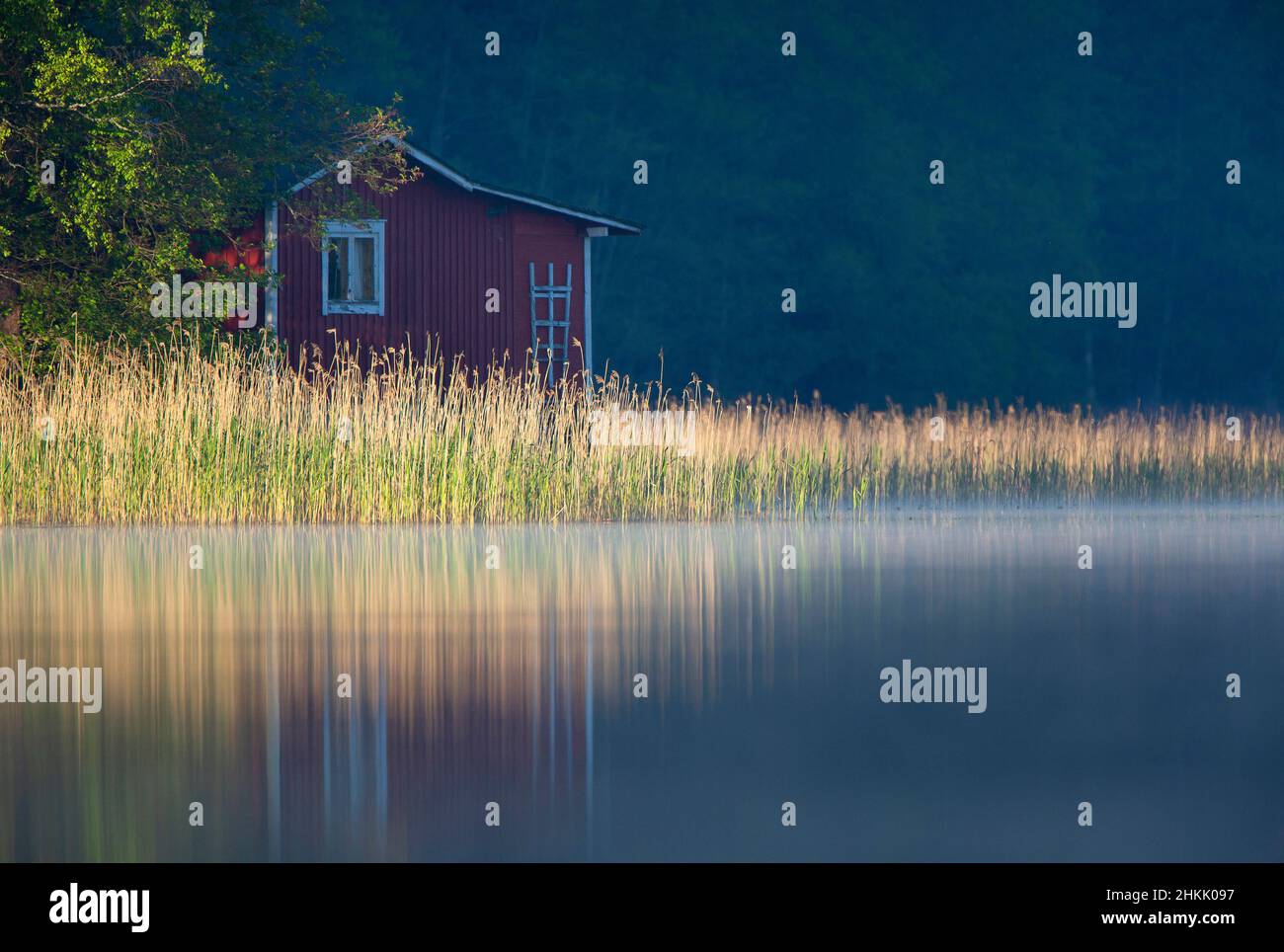 wooden cottage in Archipelago national park at sunrise, Finland, Archipelago National Park Stock Photo