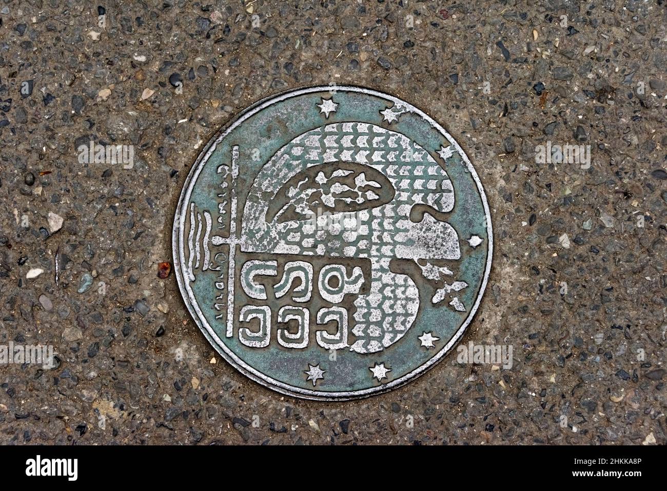 Decorated sewer cover, Tbilisi, Georgia Stock Photo