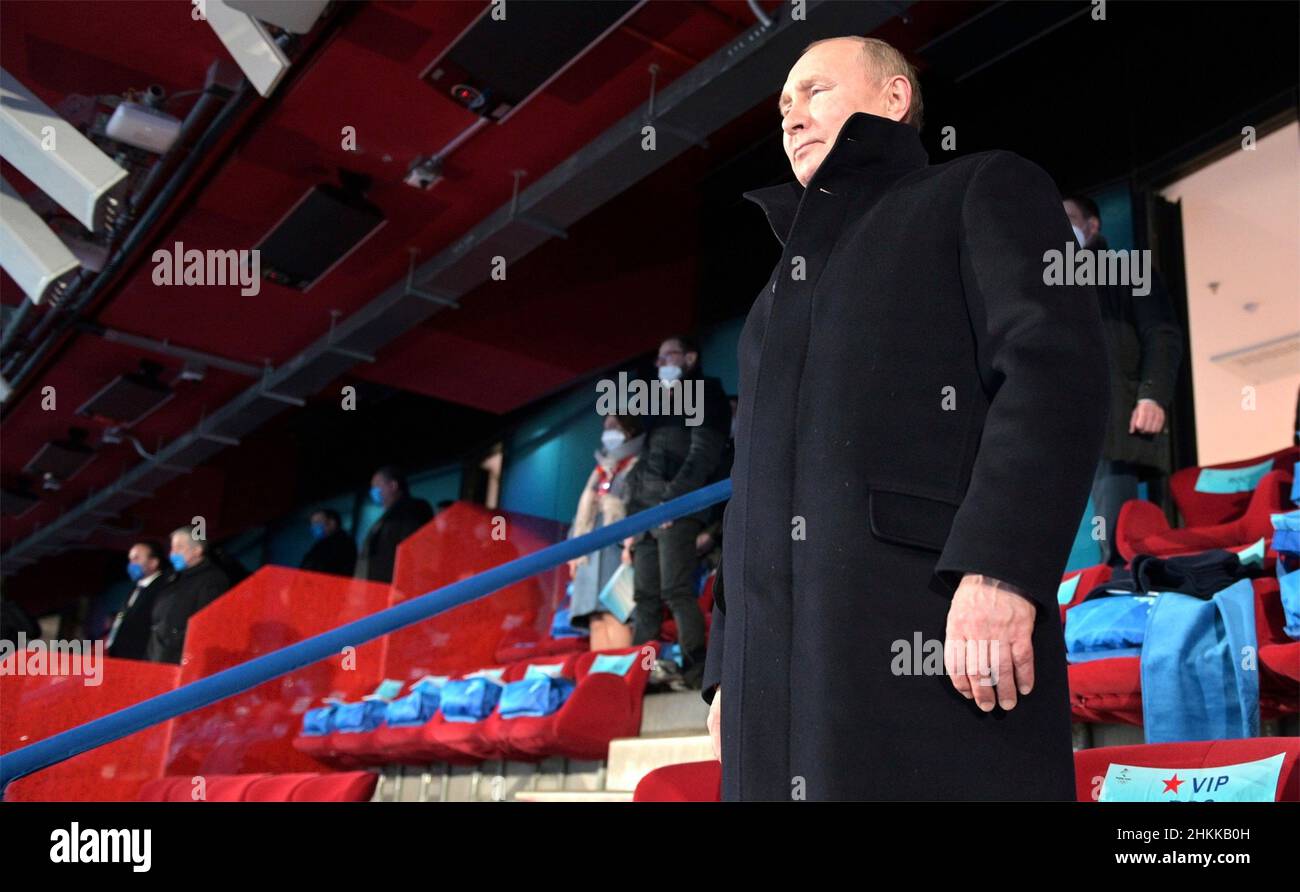 Beijing, China. 04th Feb, 2022. Russian President Vladimir Putin stands during the opening ceremony of the 2022 Beijing Winter Olympics in the VIP section of National Stadium, February 4, 2022 in Beijing, China. Putin attended the Olympics as a guest of Chinese President Xi Jinping. Credit: Alexei Druzhinin/Kremlin Pool/Alamy Live News Stock Photo