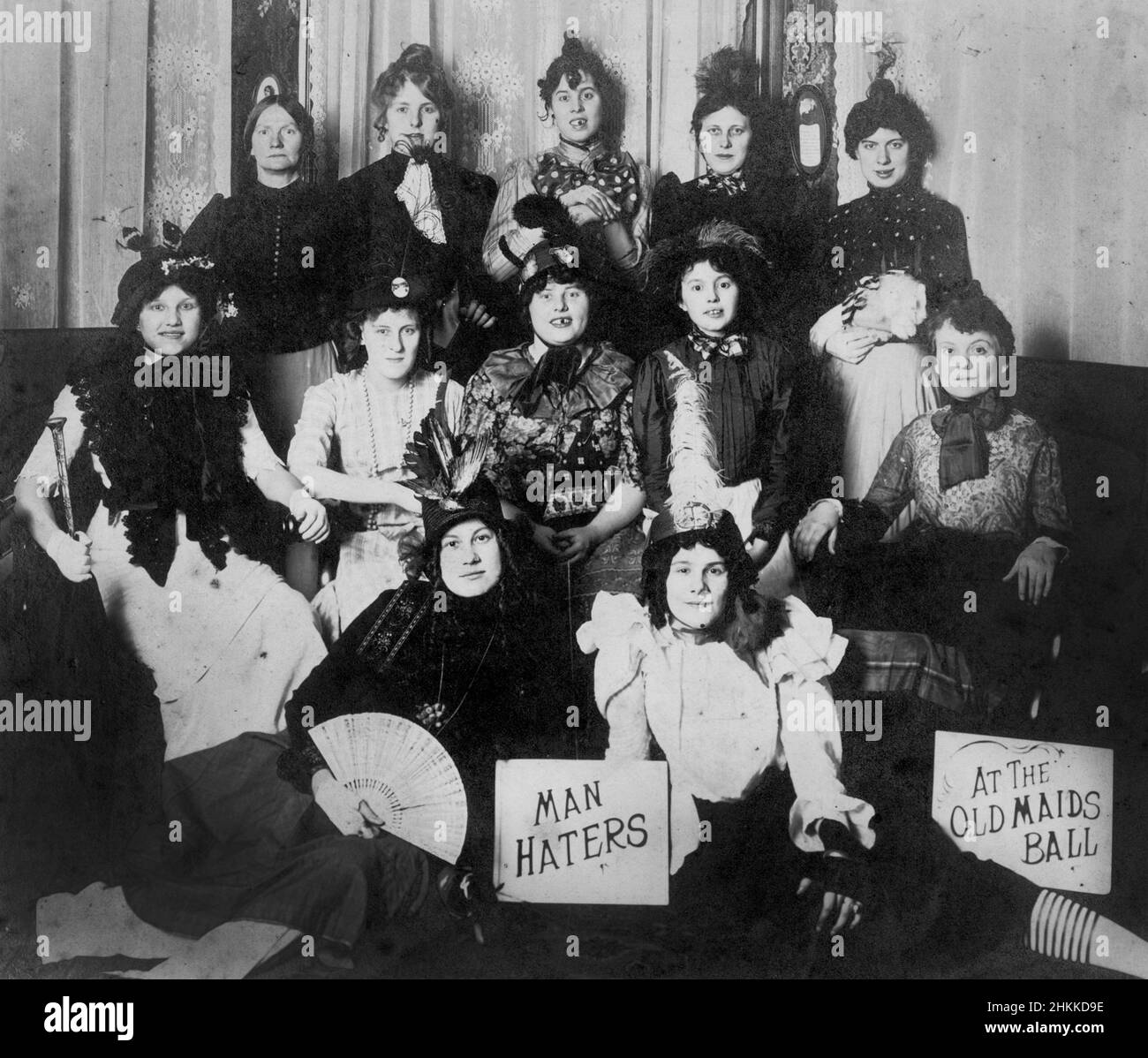 A group of costumed women are 'Man Haters' at the 'Old Maids Ball,' ca. 1910. Stock Photo