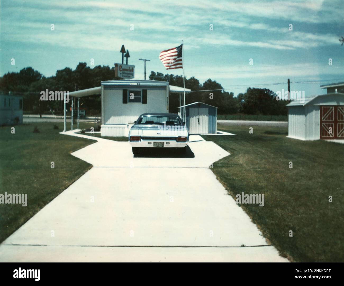 Abstract view of a car and mobile home in a trailer park in Indiana, ca. 1970. Stock Photo
