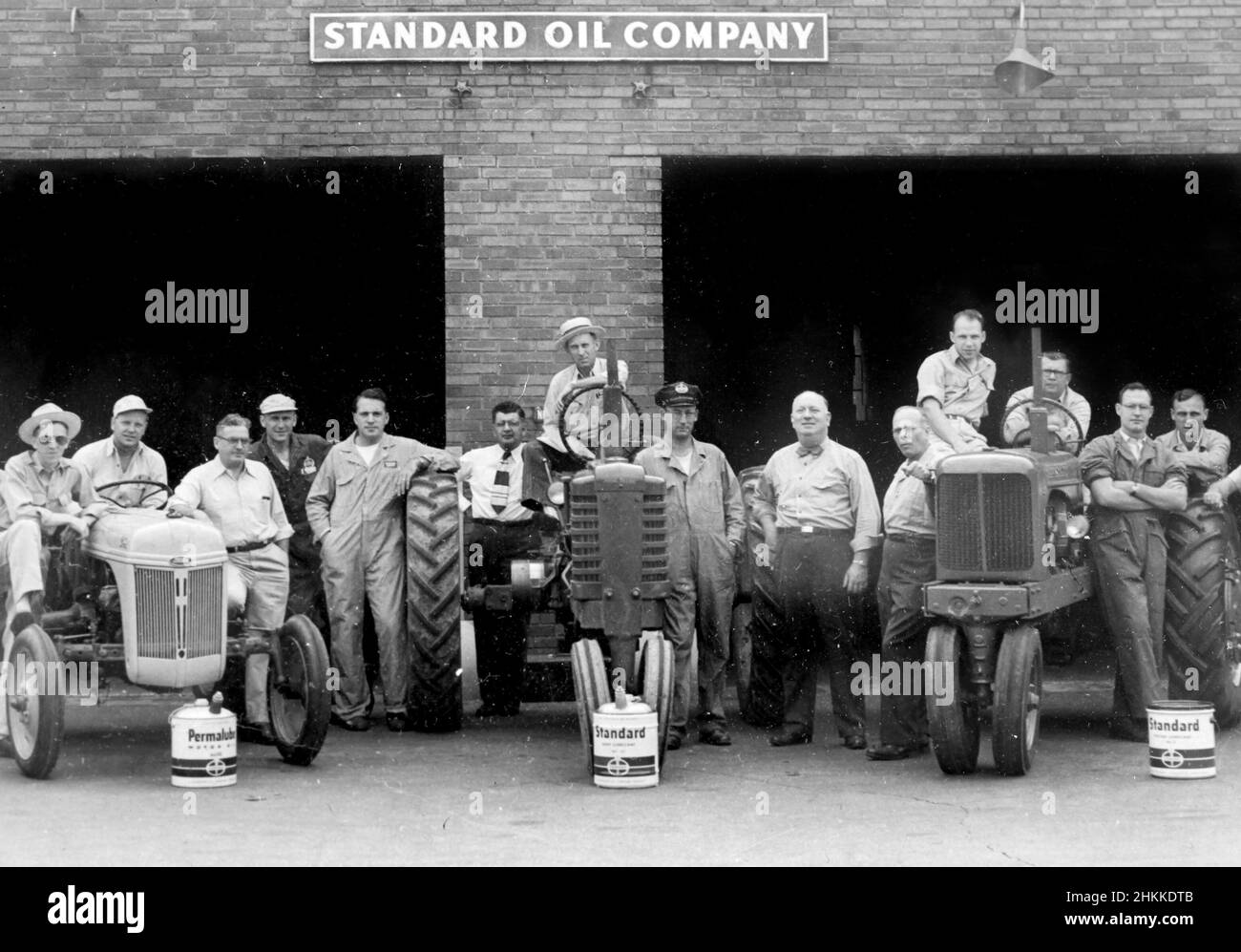 Group shot of farmers and Standard Oil workers pose, ca. 1935. Stock Photo