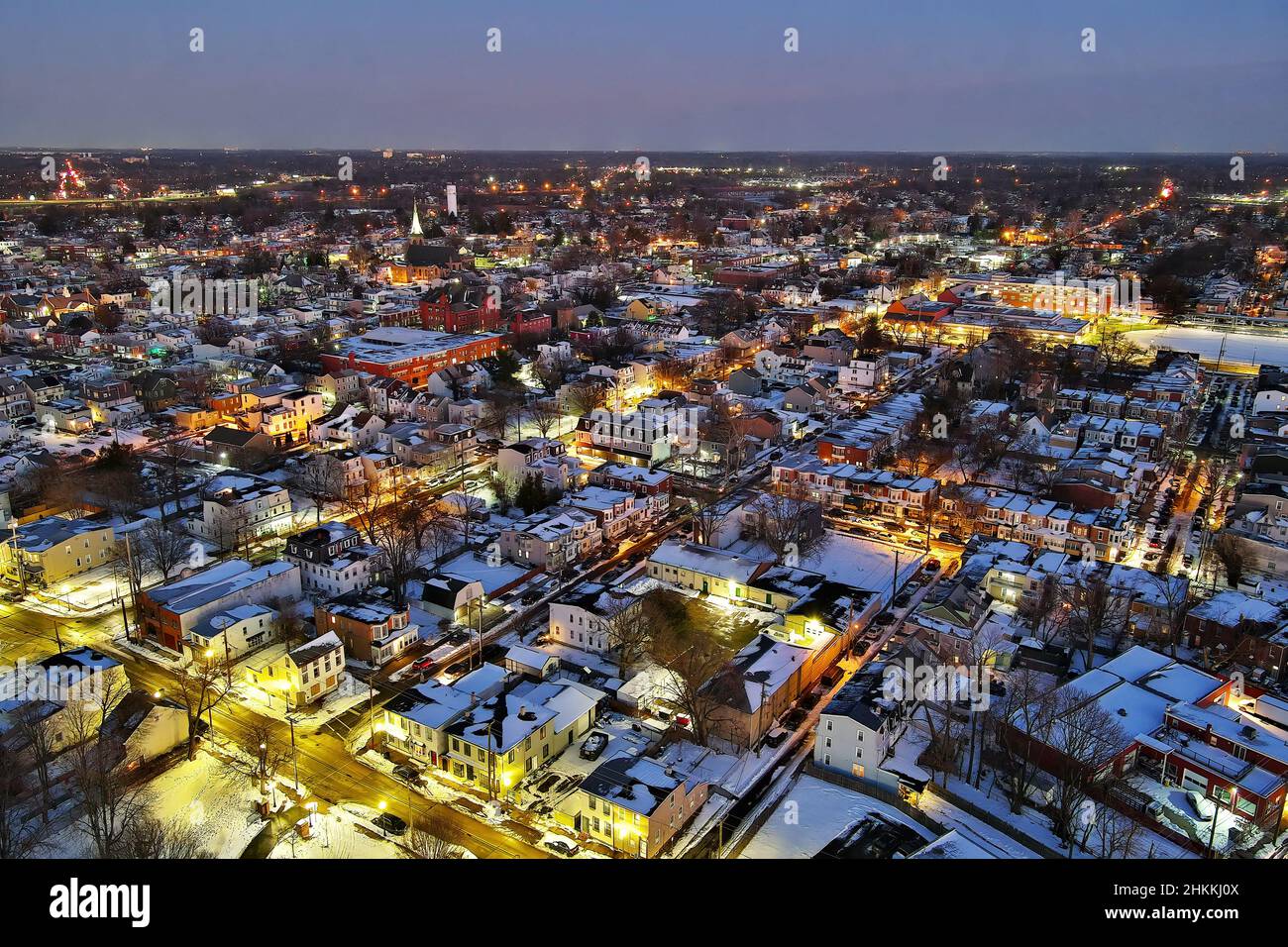 Aerial View of Riverfront Town at Night with Snow Stock Photo - Alamy