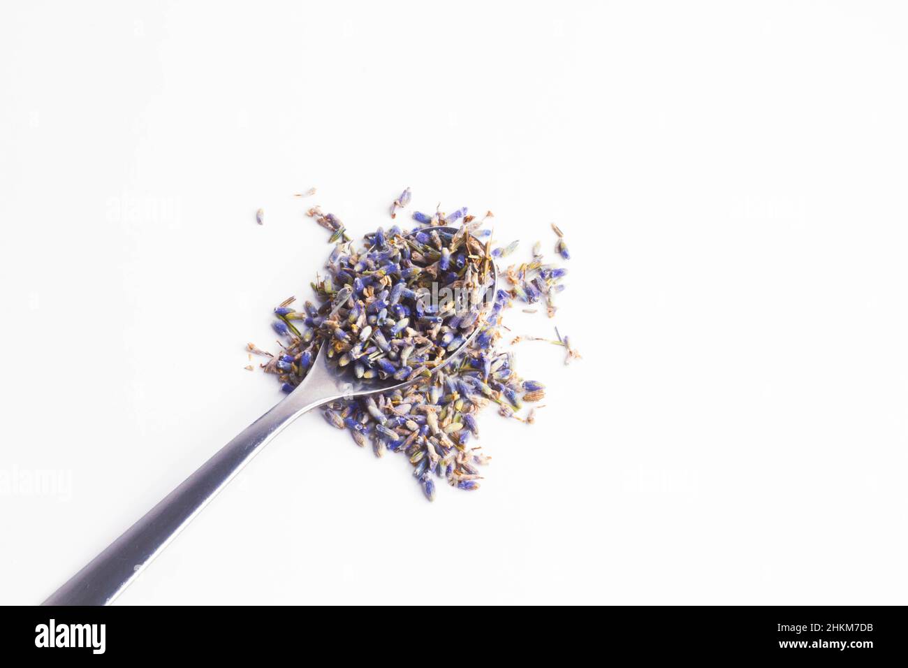 Dry lavender flowers. Tea from lavender flowers. Healing herbs of mountain lavender. On white