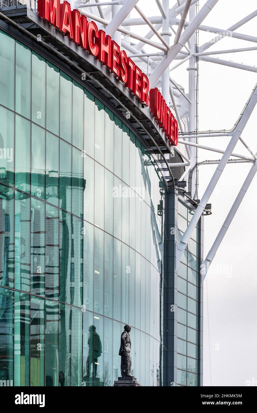 Old Trafford football ground, home to Manchester United FC. Sir Matt Busby statue. Stock Photo