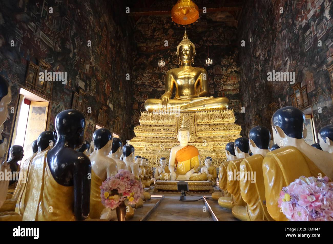 Ubosot or Ordination Hall with 80 disciples of Lord Buddha, Wat Suthat, Bangkok, Thailand Stock Photo