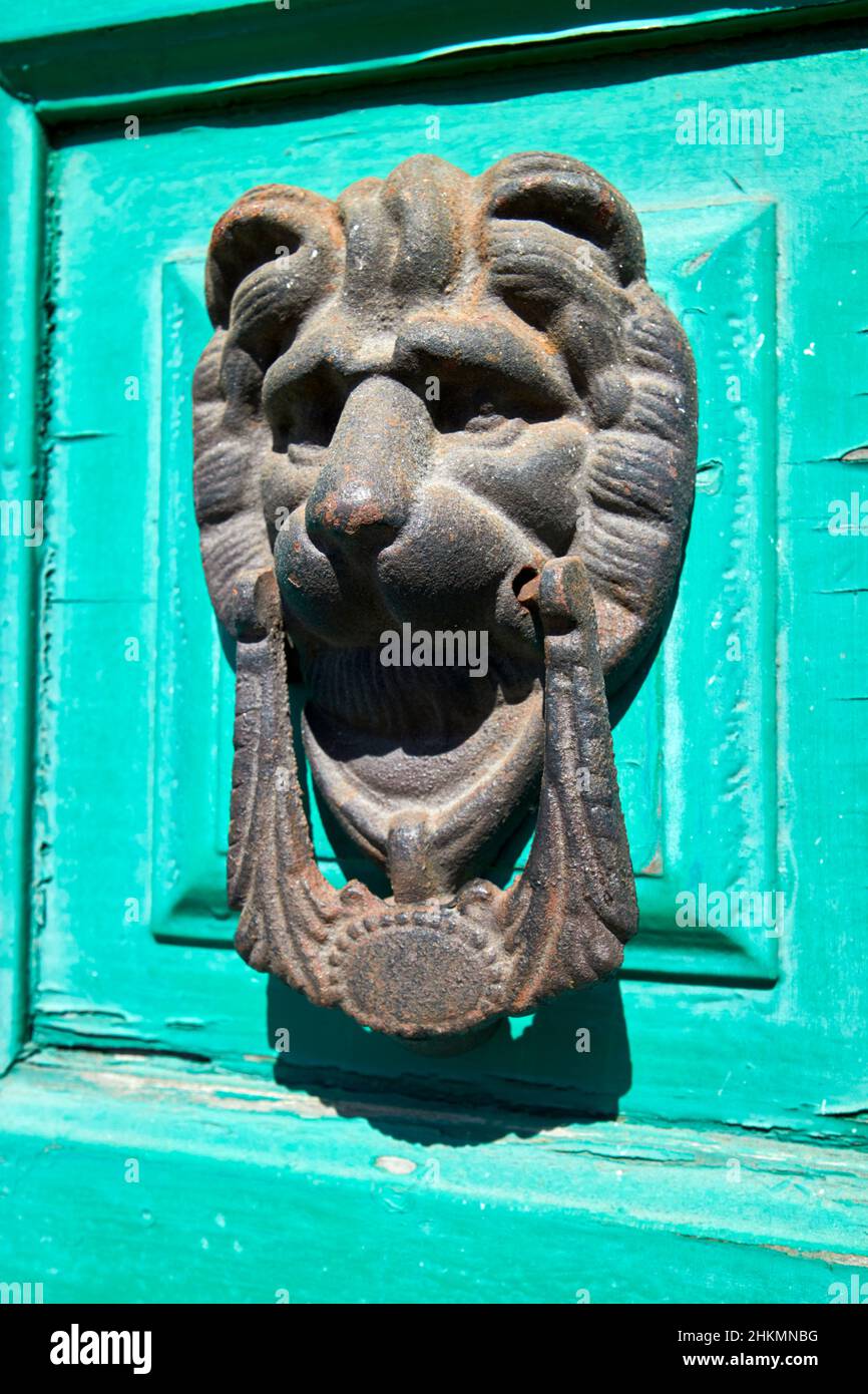 ornate lions head door knocker Teguise Lanzarote Canary Islands Spain Stock Photo