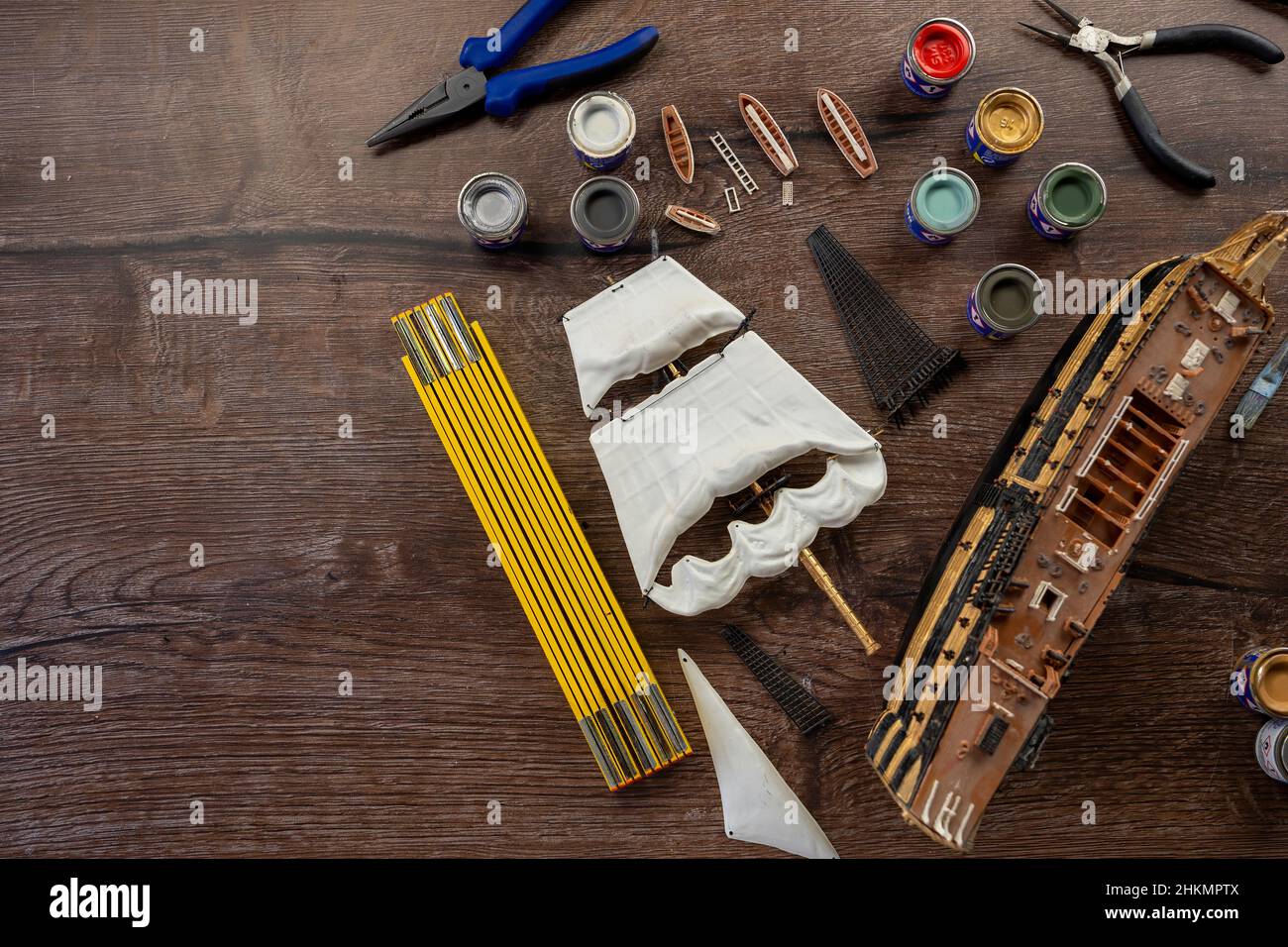 Model Ship Building handcraft on table with different materials with writing space Stock Photo