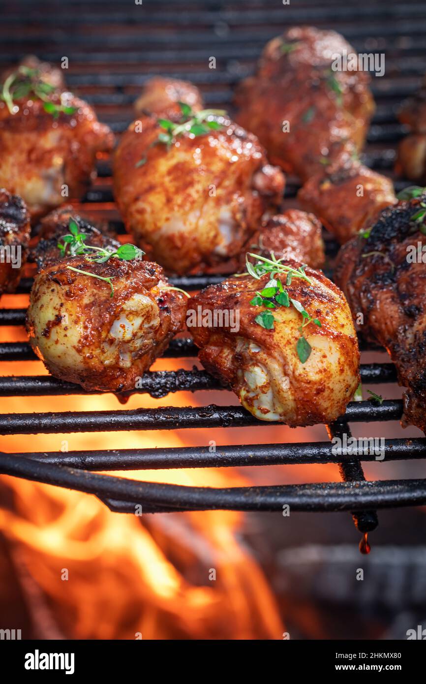 Hot roasted chicken leg marinated with honey and spices. Roasted