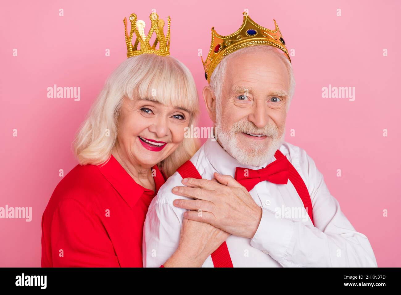 Queen And King With Crowns Hugging Isolated Free Stock Photo and