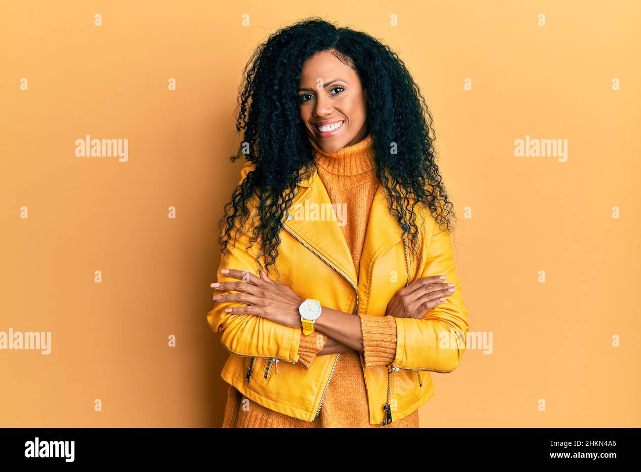 Middle age african american woman wearing wool winter sweater and ...