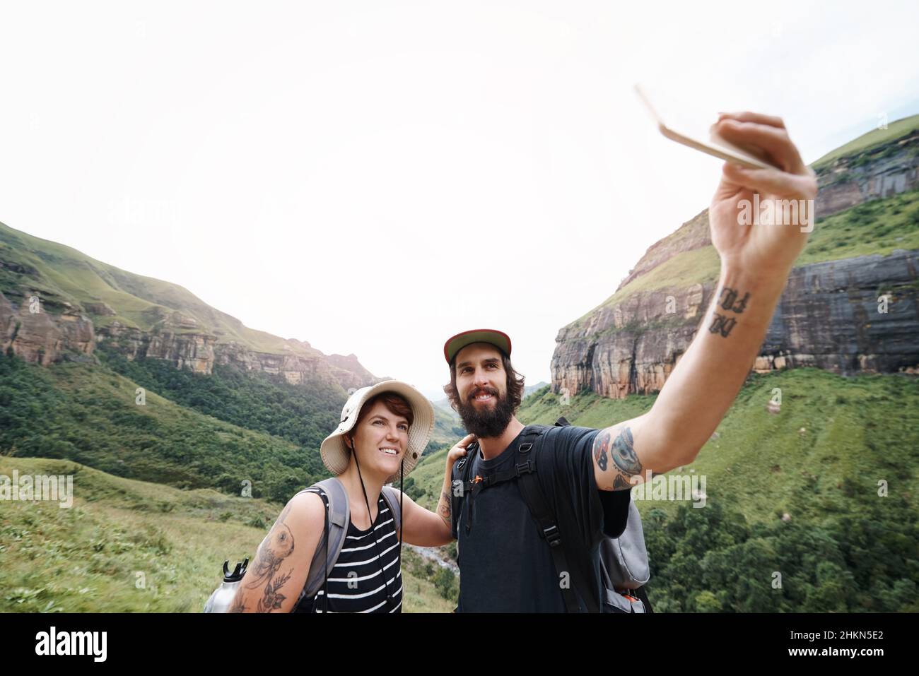 Documenting their adventures together Stock Photo