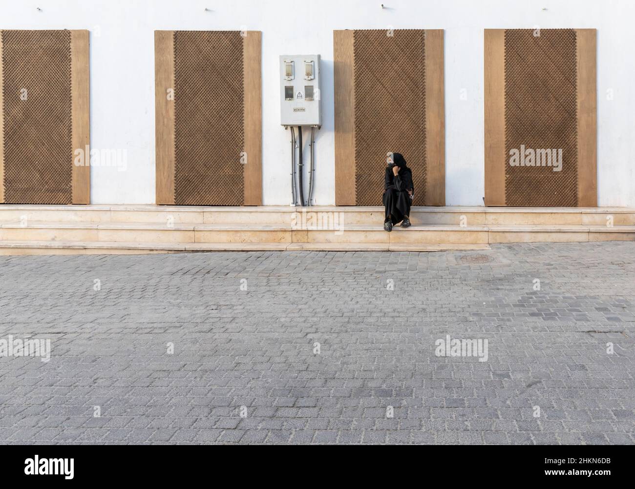 Jeddah, Saudi Arabia, 6th January 2022: arab woman street scene in old Jeddah Stock Photo