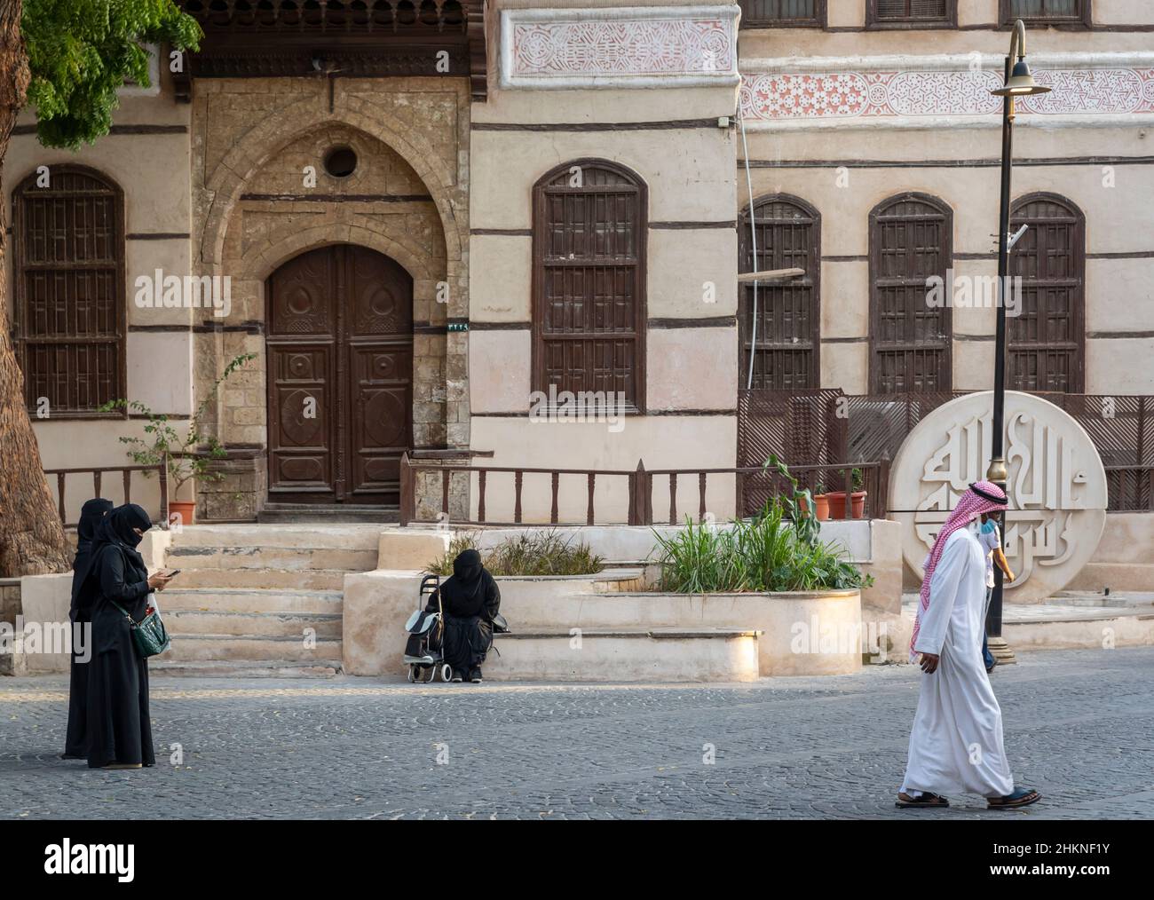 Jeddah, Saudi Arabia, 6th January 2022: Naseef House, restored as museum, streetlife scene in old Jeddah Stock Photo