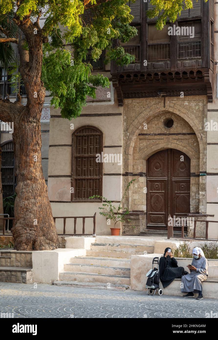 Jeddah, Saudi Arabia, 6th January 2022: Naseef House, restored as museum, streetlife scene in old Jeddah Stock Photo