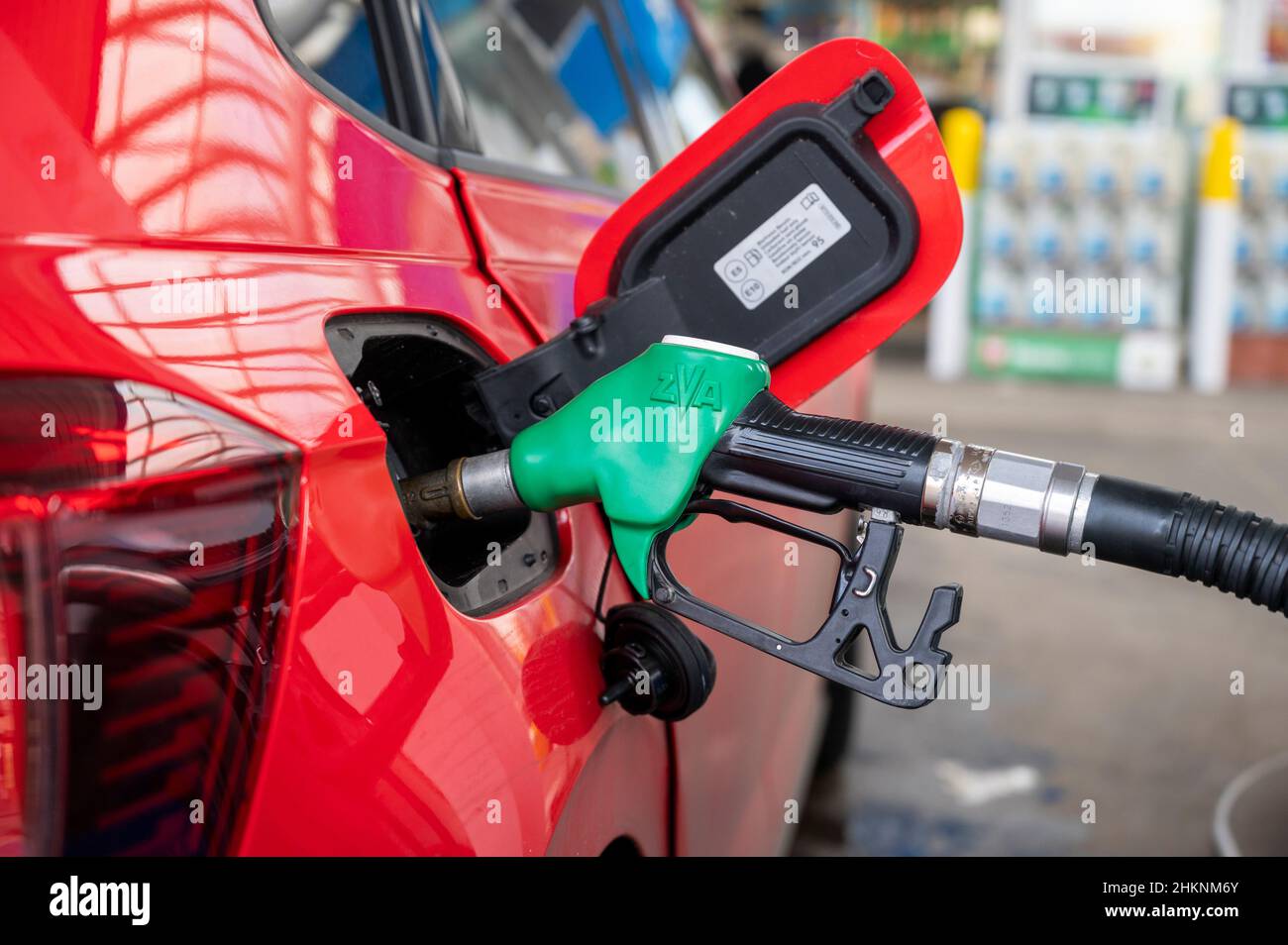 Slubice, Poland. 05th Feb, 2022. A car is parked at a gas station and is being refueled. Due to a reduction in VAT on food and fuel from 23 to 8 percent, refueling in Poland is significantly cheaper than in Germany. Credit: Christophe Gateau/dpa/Alamy Live News Stock Photo