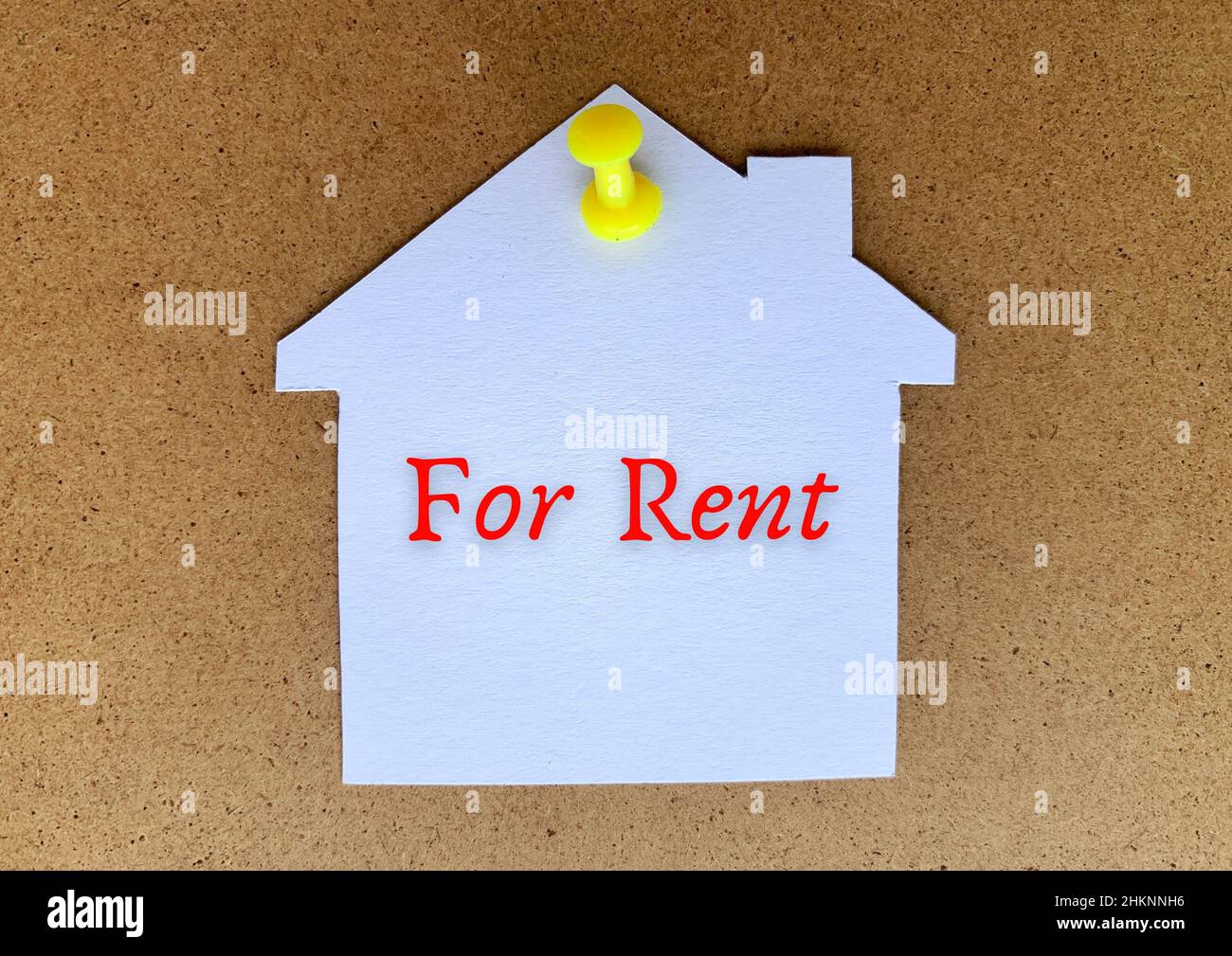 For rent text model house hanging on a wall. Property concept Stock ...