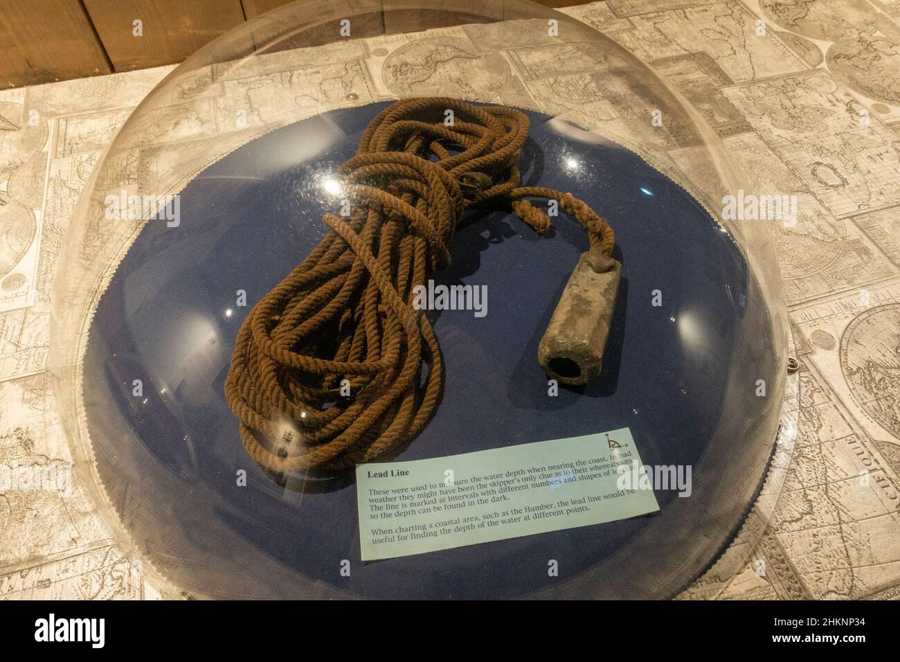 A lead line used to measuire water depth on display in the Grimsby Fishing Heritage Centre, Grimsby, UK. Stock Photo