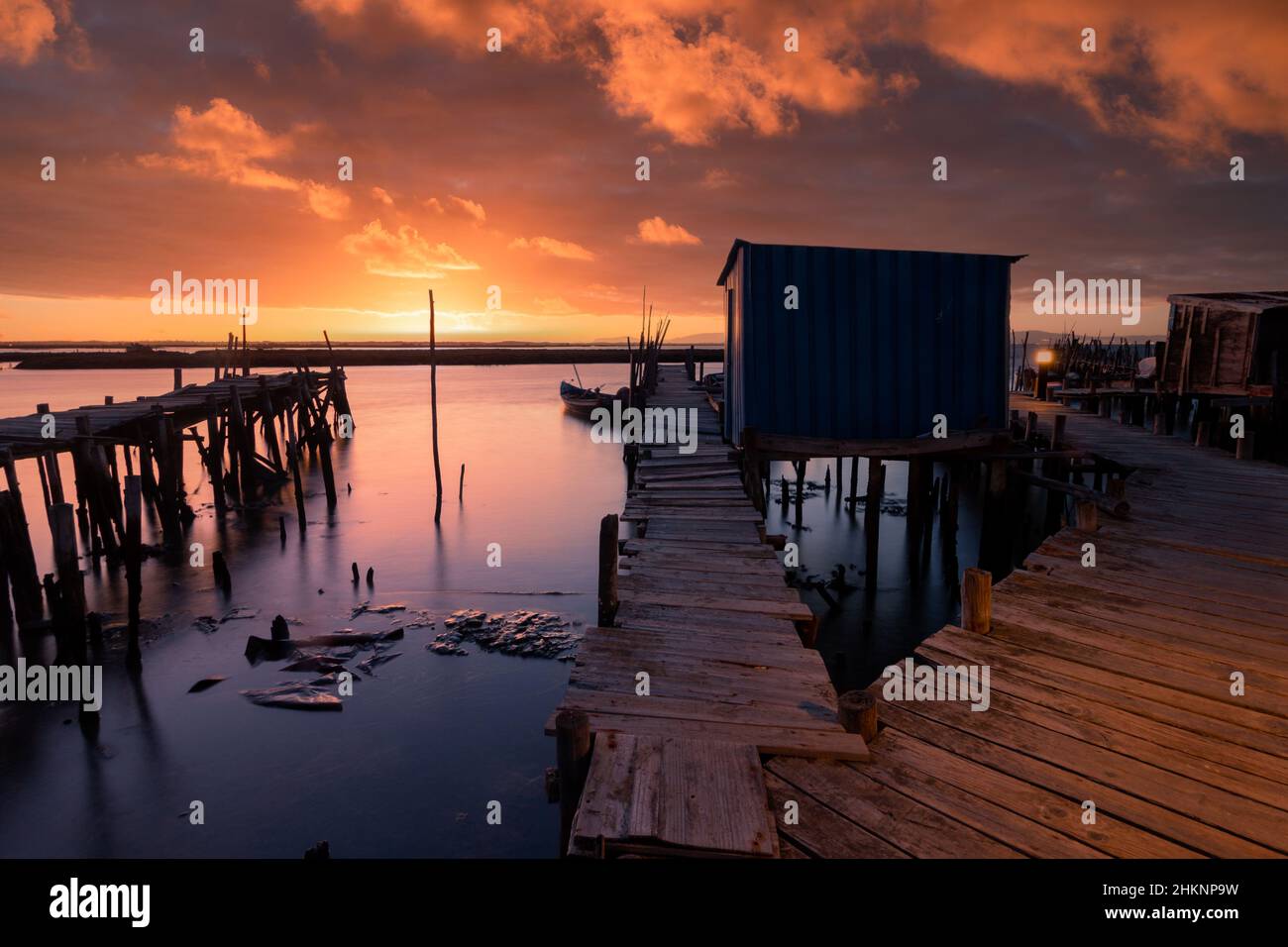 Long exposure seascape at sunset. Palafitic Pier in Carrasqueira. Comporta. Portugal Stock Photo