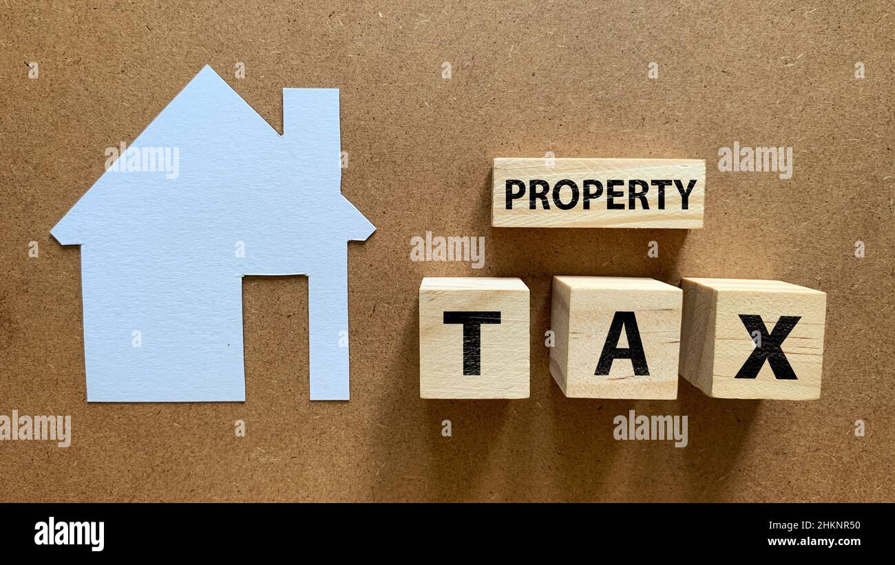Top view of property tax text on wooden blocks. Tax concept. Stock Photo