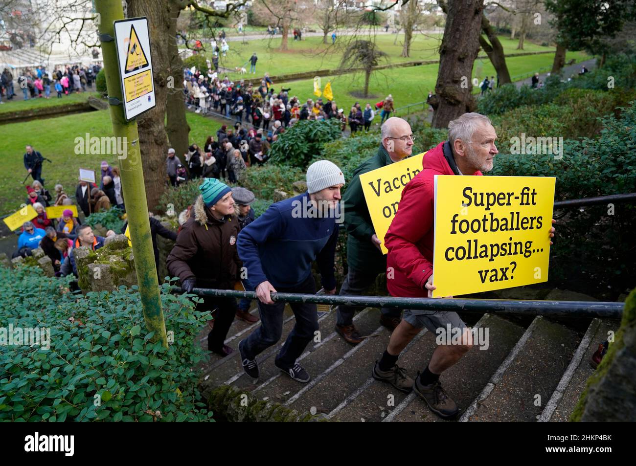 People walk out of the Central Gardens in Bournemouth after a rally as part of the anti-vax Bournemouth outreach march. Picture date: Saturday February 5, 2022. Stock Photo