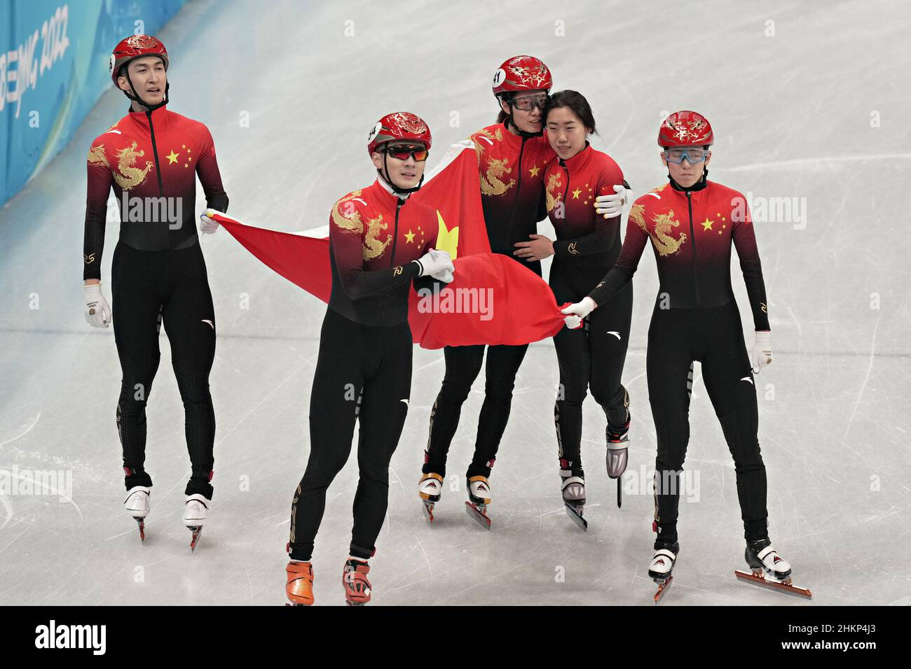 Beijing, China. 05th Feb, 2022. The Chinese Short Track Speed Skating Mixed Relay team celebrate after taking the first ever gold medal in the event, new to the Beijing Winter Olympic in Beijing on Saturday, February 5, 2022. China won the gold medal, Italy the silver medal and Hungary the bronze. Photo by Richard Ellis/UPI Credit: UPI/Alamy Live News Stock Photo