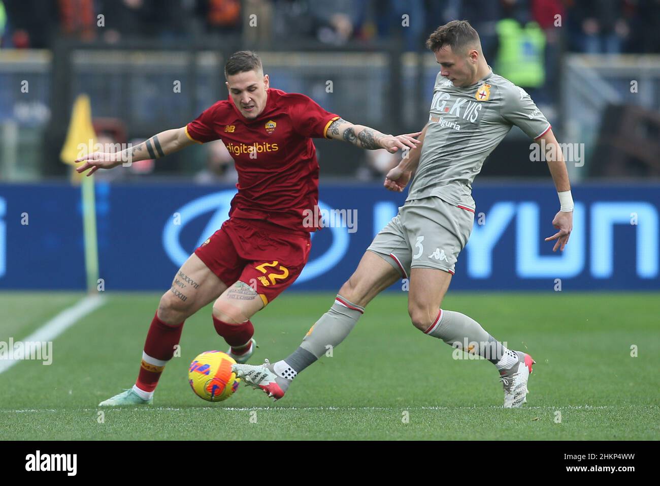 Johan Vasquez of Genoa CFC and Nicolò Zaniolo of AS Roma during football  Serie A Match at Stadio Olimpico, As Roma v Genoa on February 5, 2022 in  Rome, Italy. (Photo by