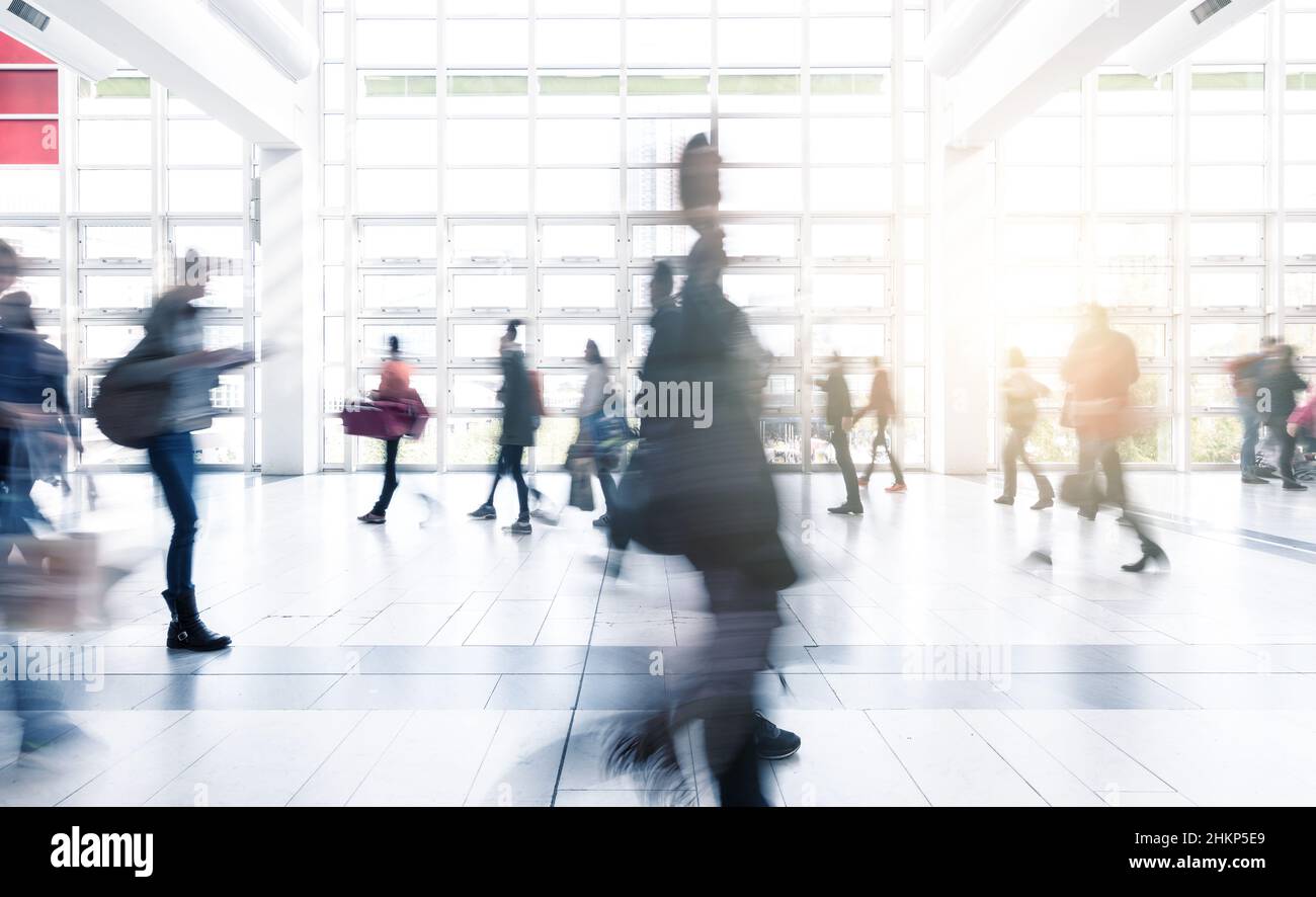 abstrakt image of people at a tradeshow floor Stock Photo