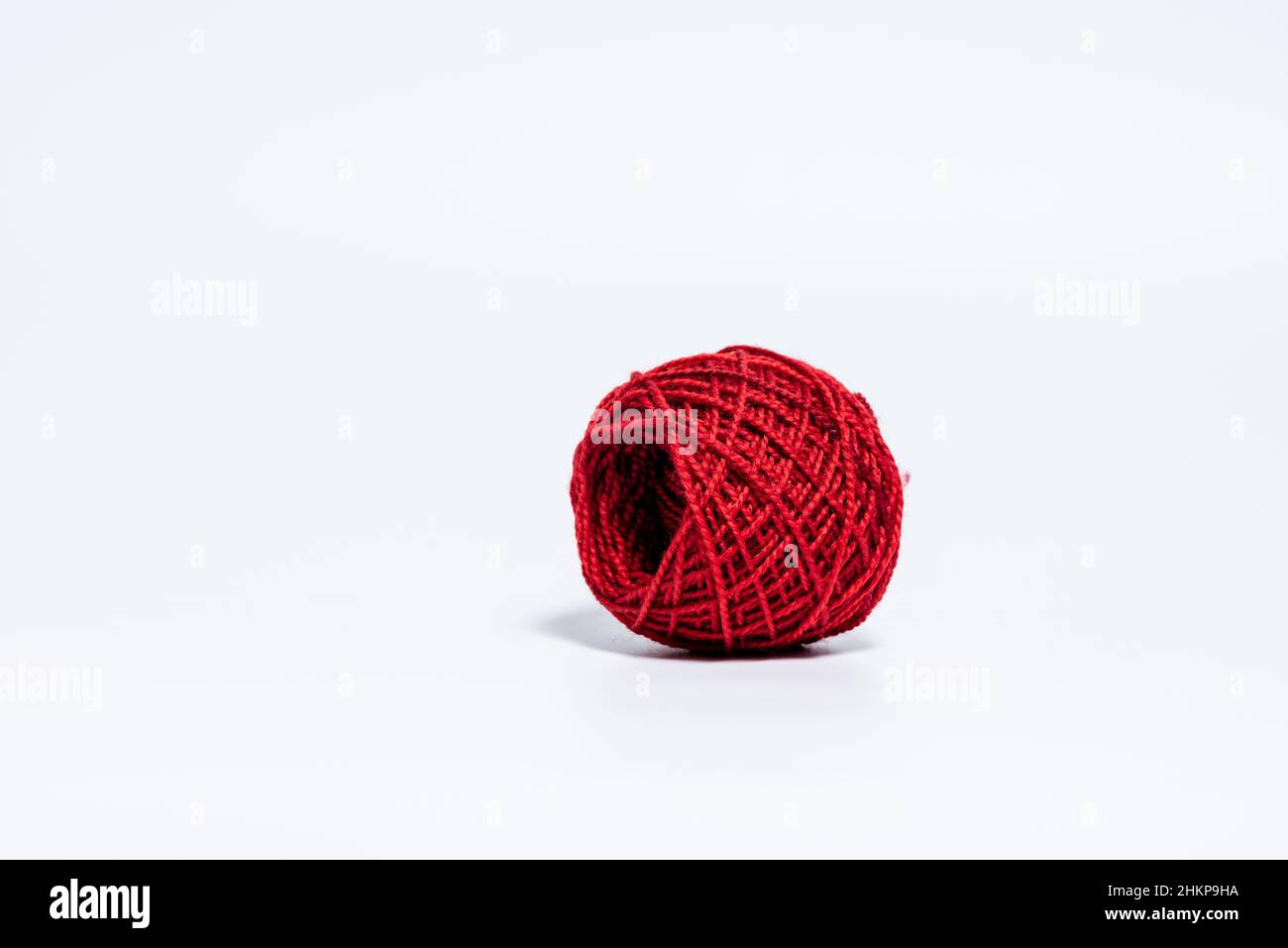 Red thread isolate on white background. Selective focus Stock Photo - Alamy